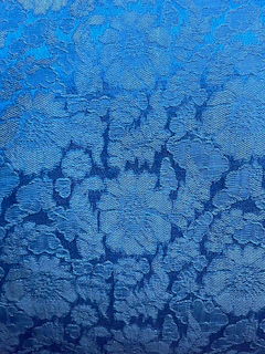 Blue floral textured fabric with gradient