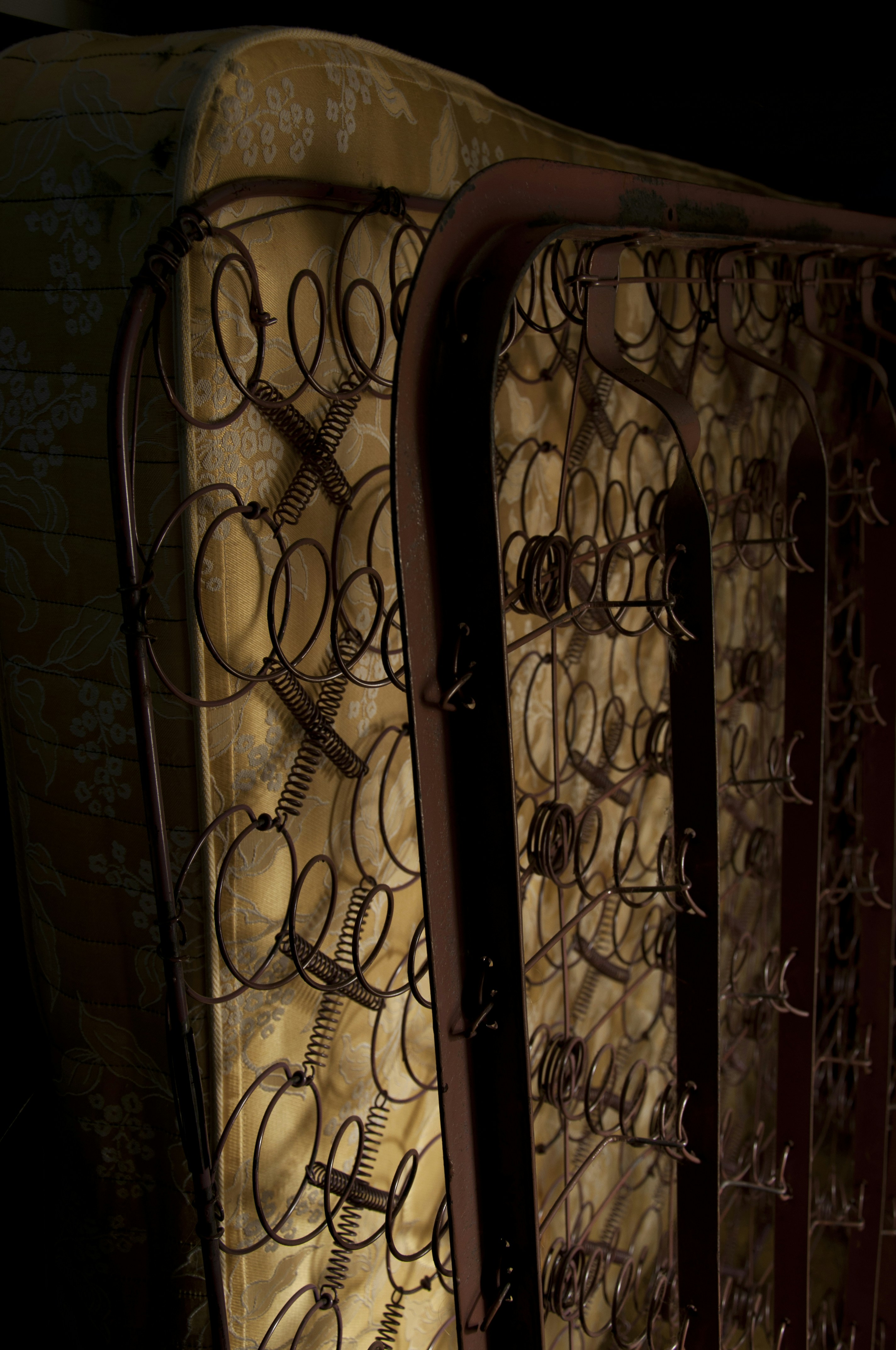 Close-up of old mattress springs and fabric