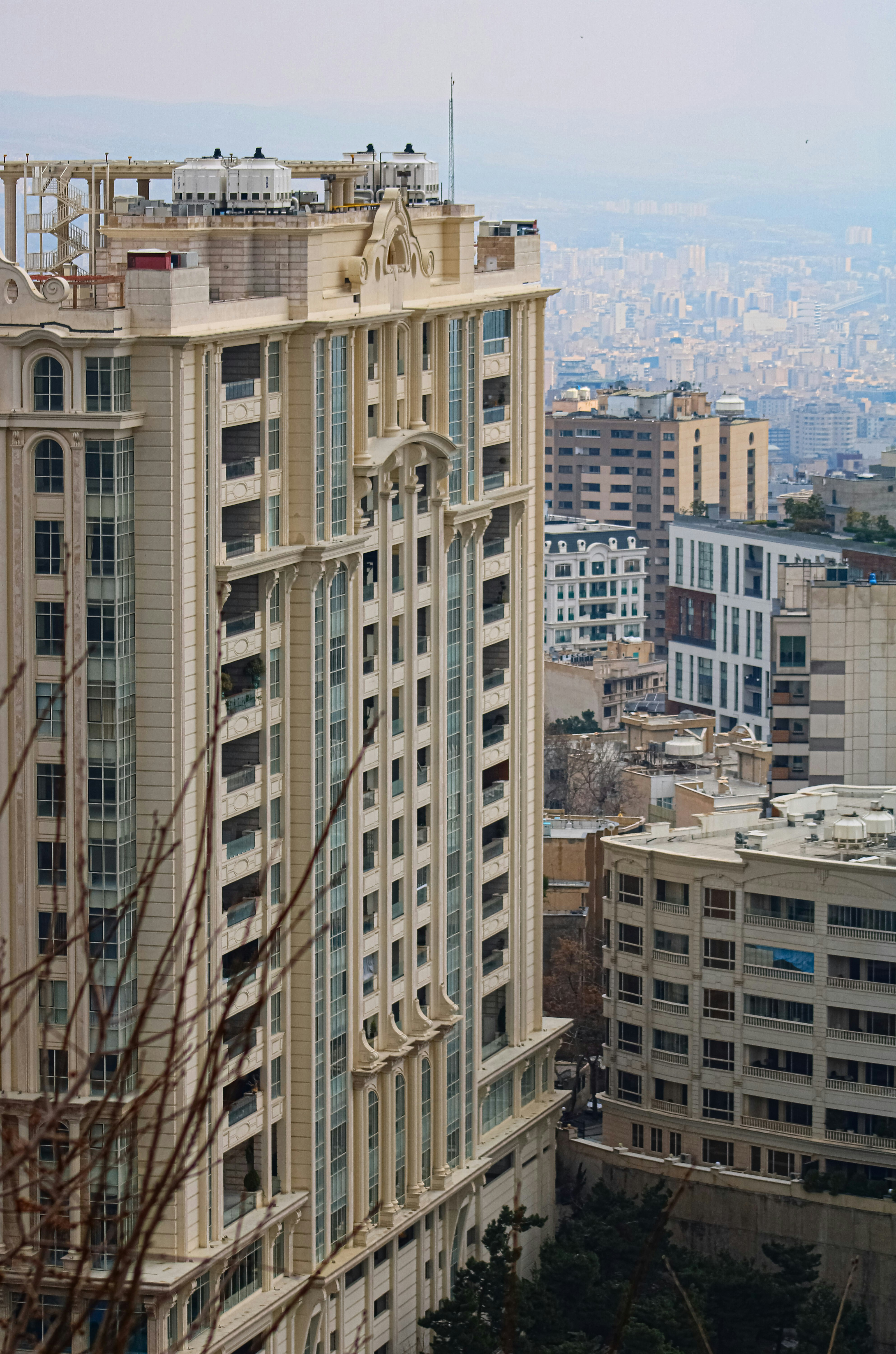 Tall, ornate building overlooking a cityscape