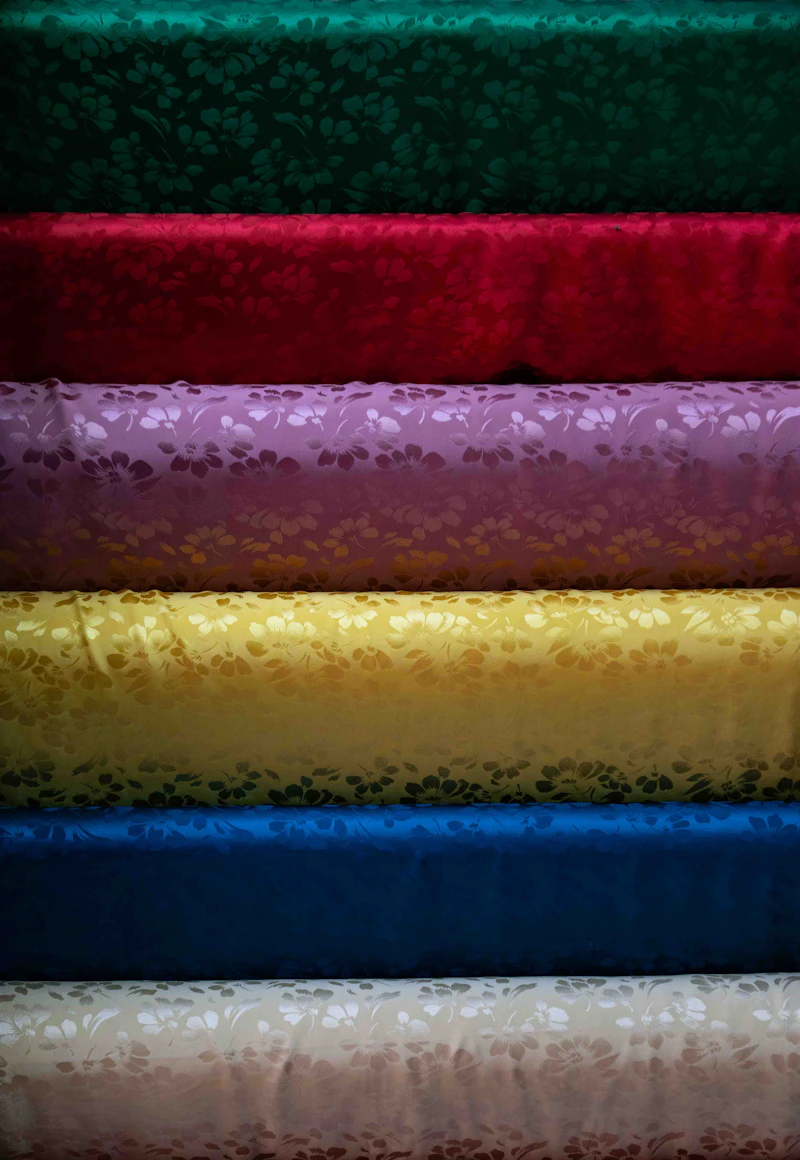 Colourful hand-block printed cotton bedsheet fabric rolls