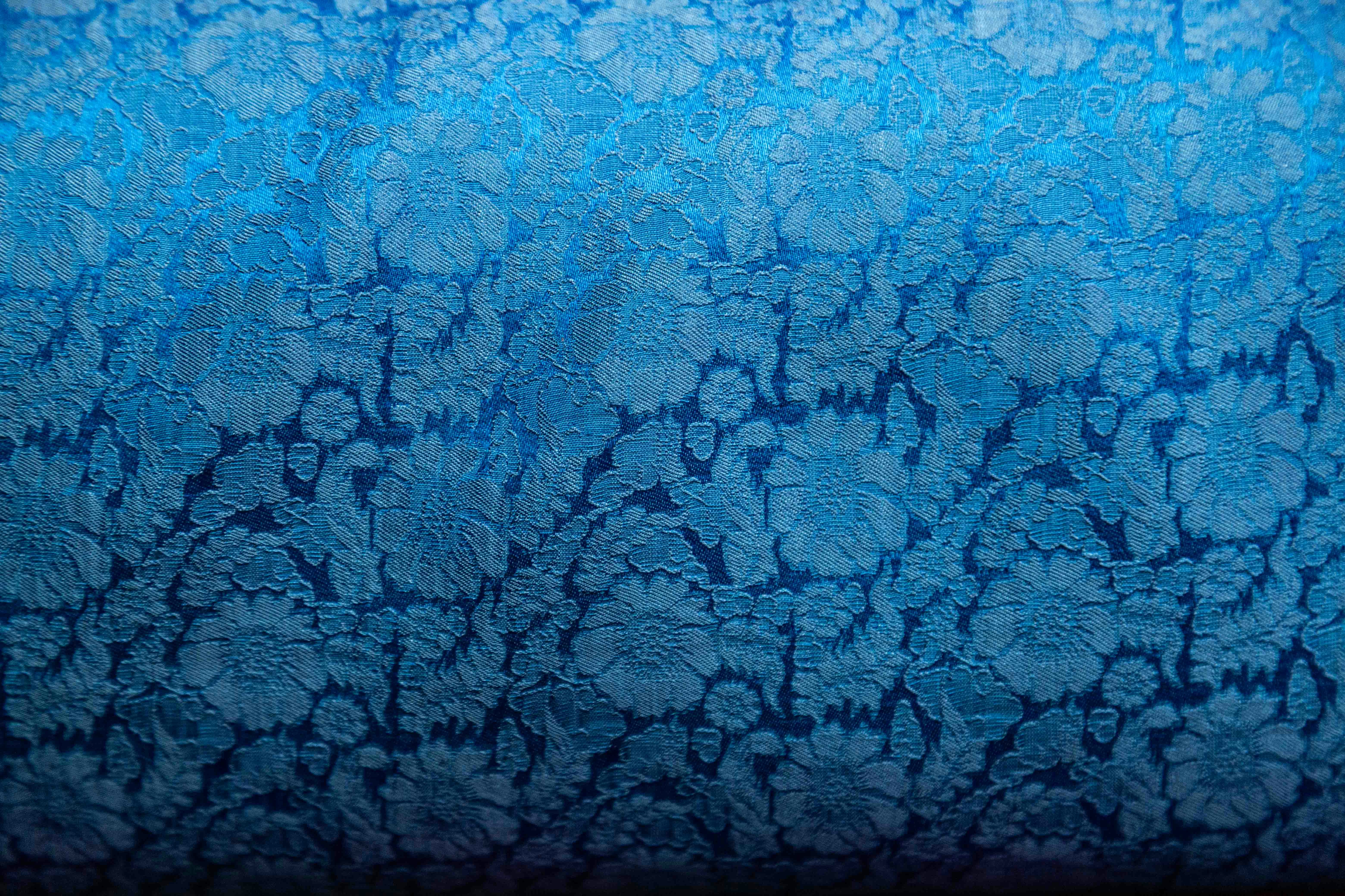 Blue floral pattern with a gradient effect