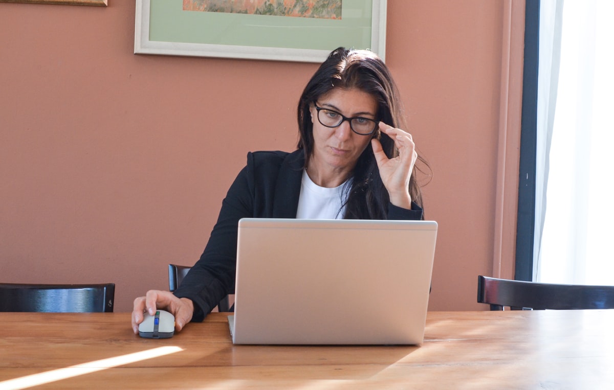 Solo attorney getting started with AI legal software on a laptop