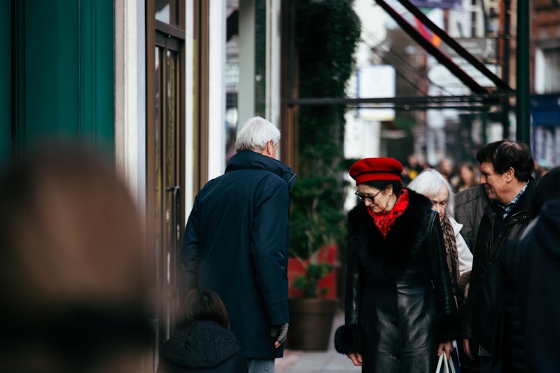 people strolling on urban street in winter