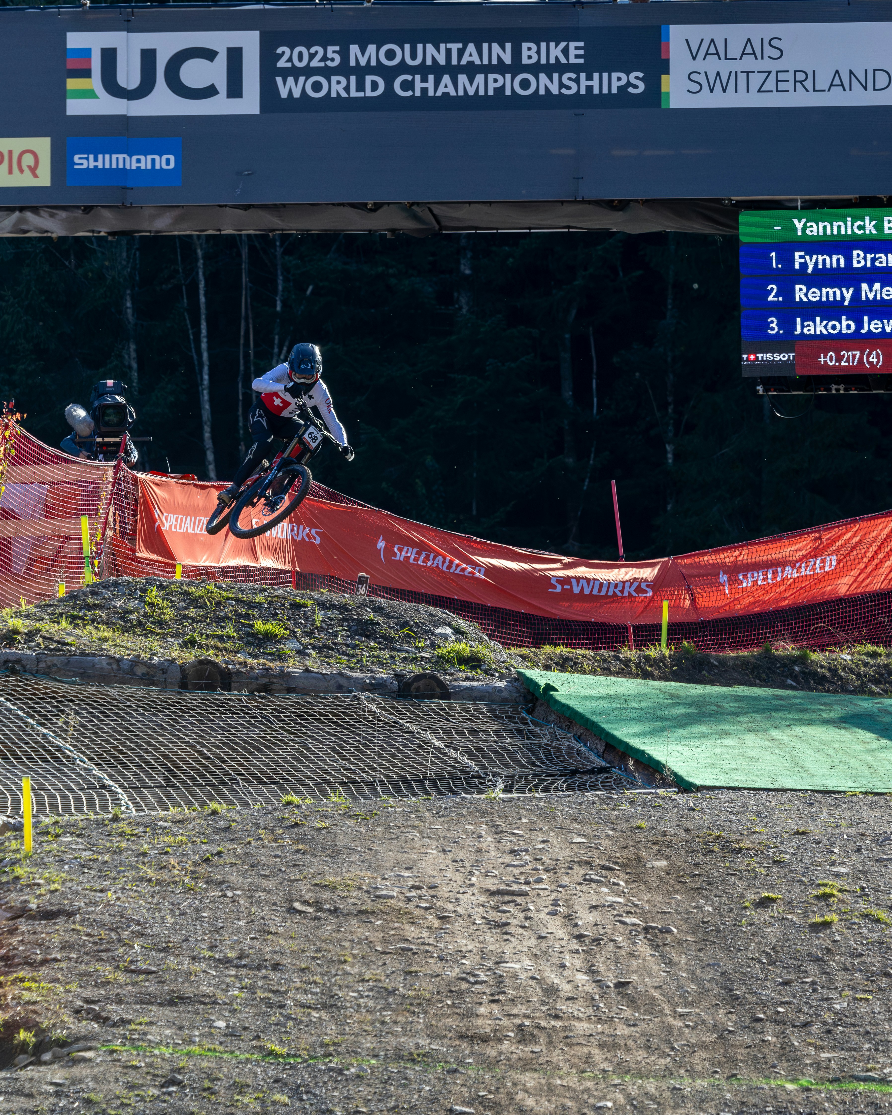 Cyclist jumps during a mountain bike race event.