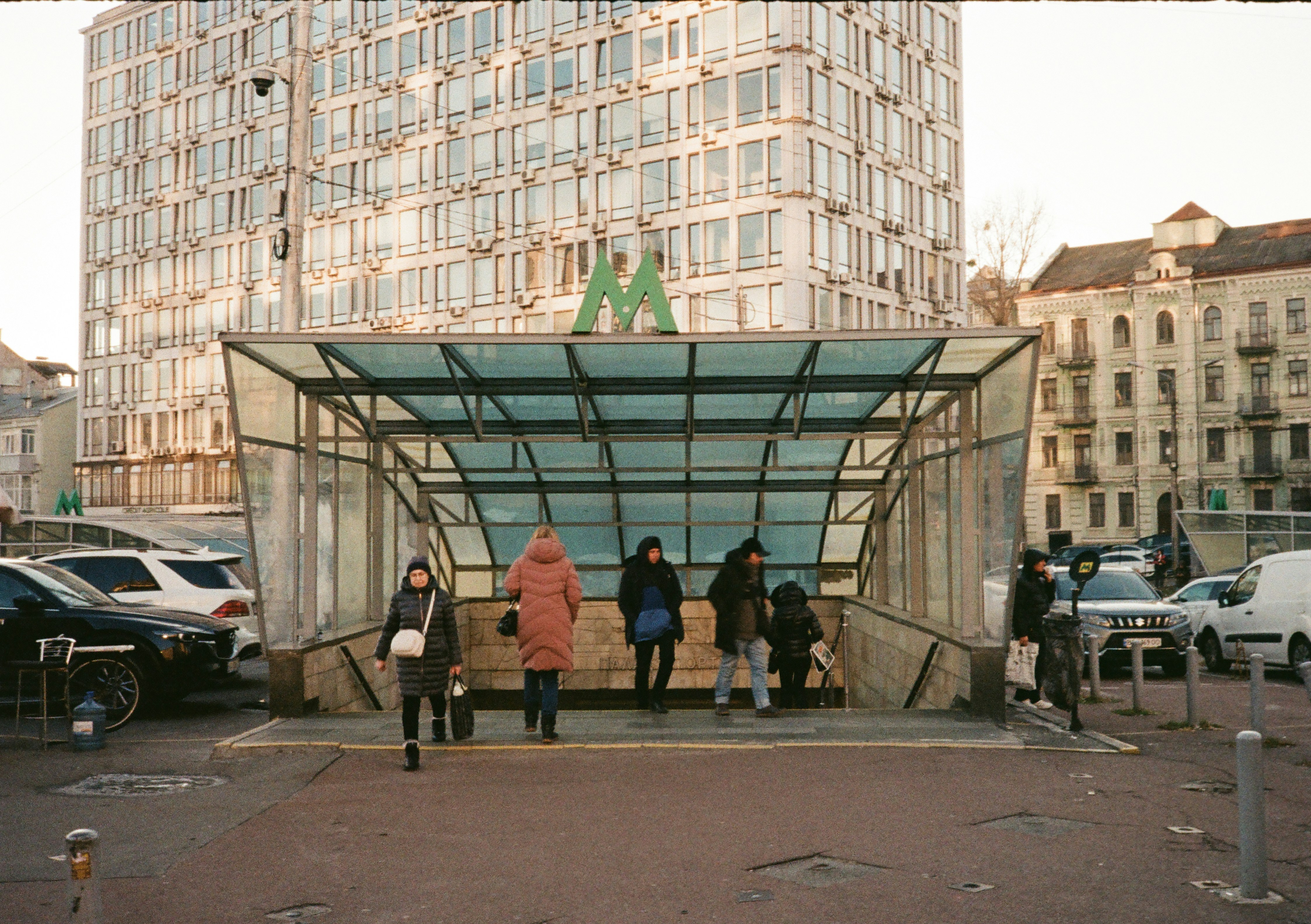people entering a metro station