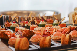 Assortment of gourmet appetizers and canapés on a platter
