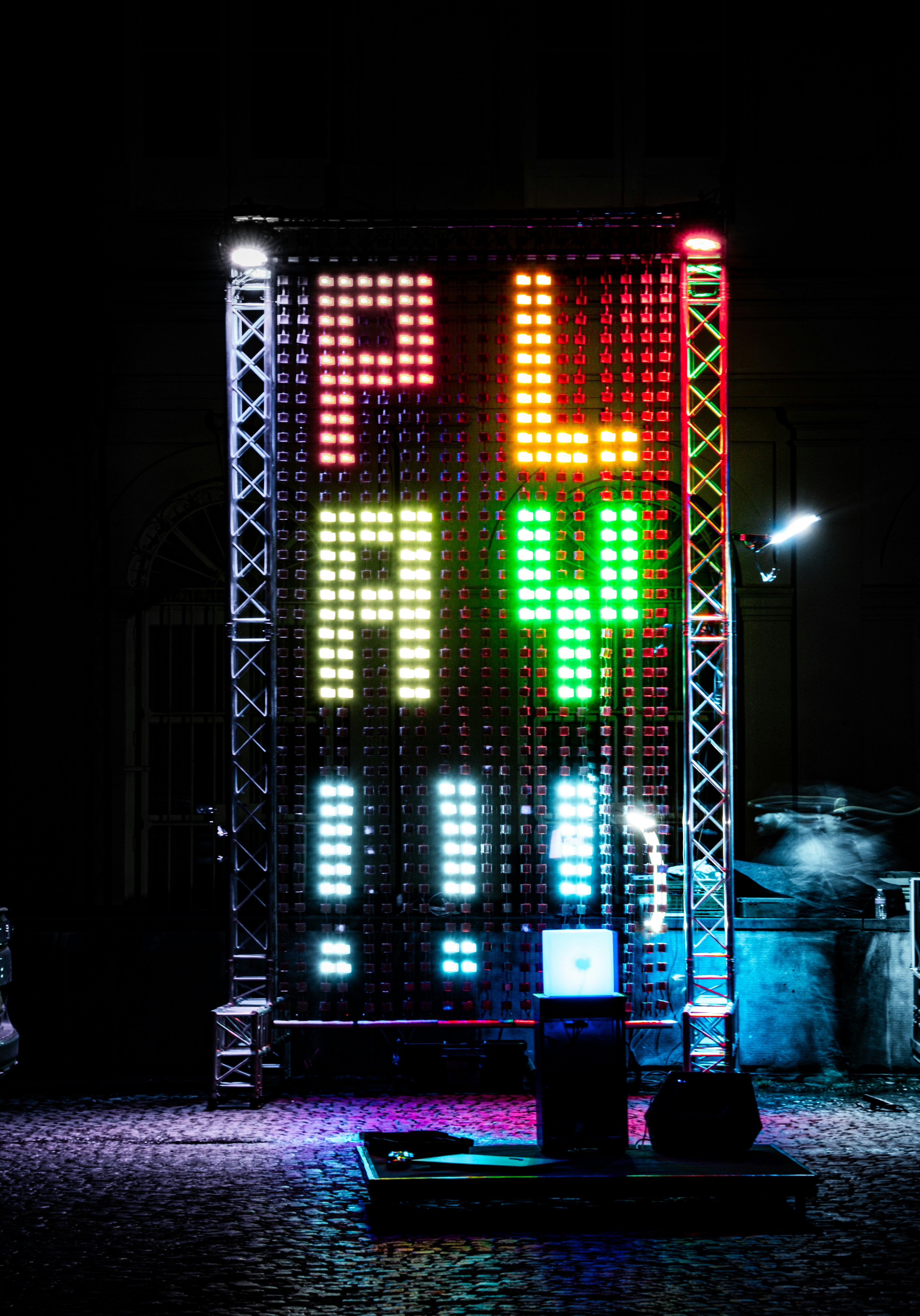 Large led screen displaying the word play