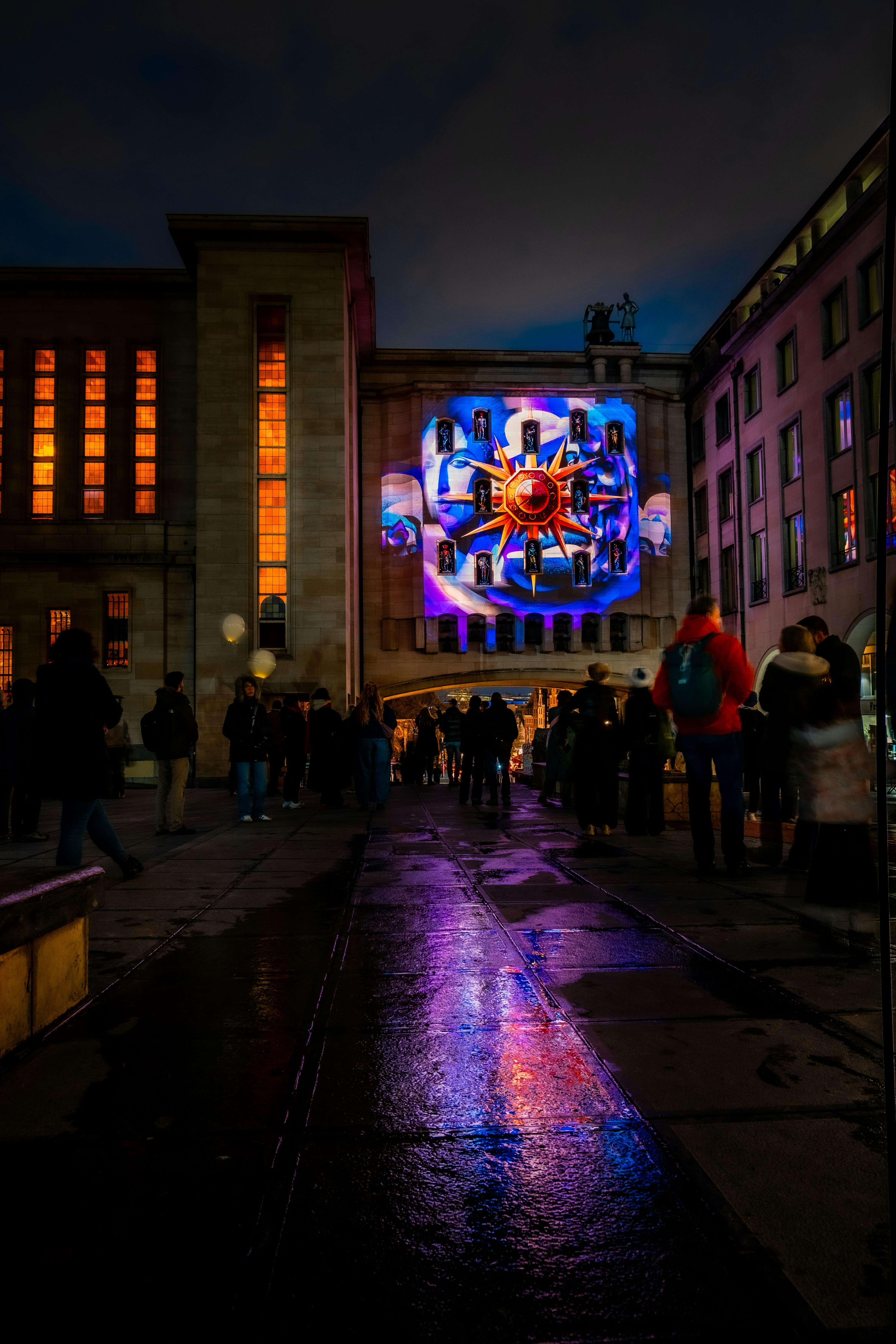Building facade illuminated with colorful light projection at night