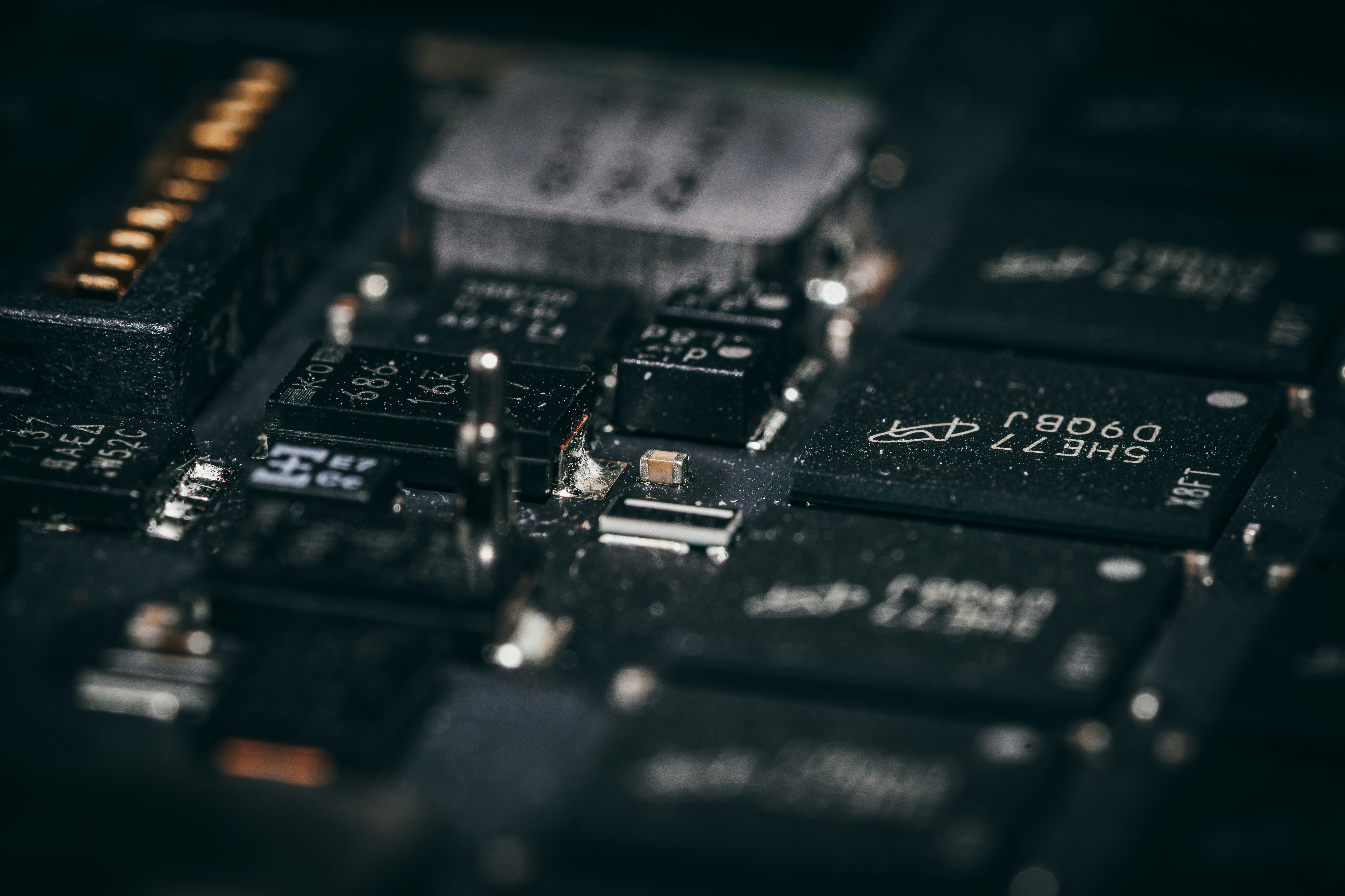 Close-up of a complex electronic circuit board with many components.