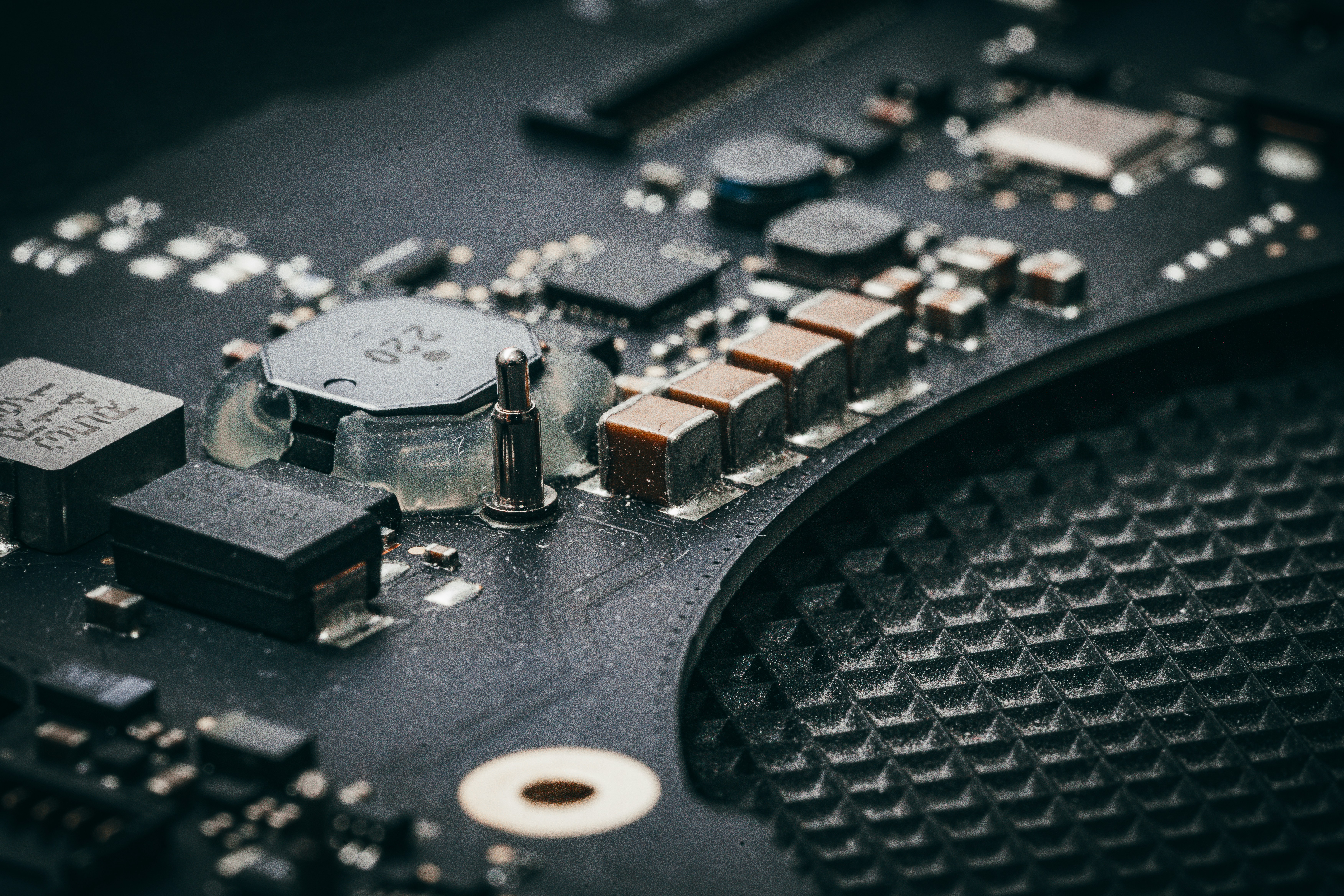 Close-up of a complex electronic circuit board with many components.