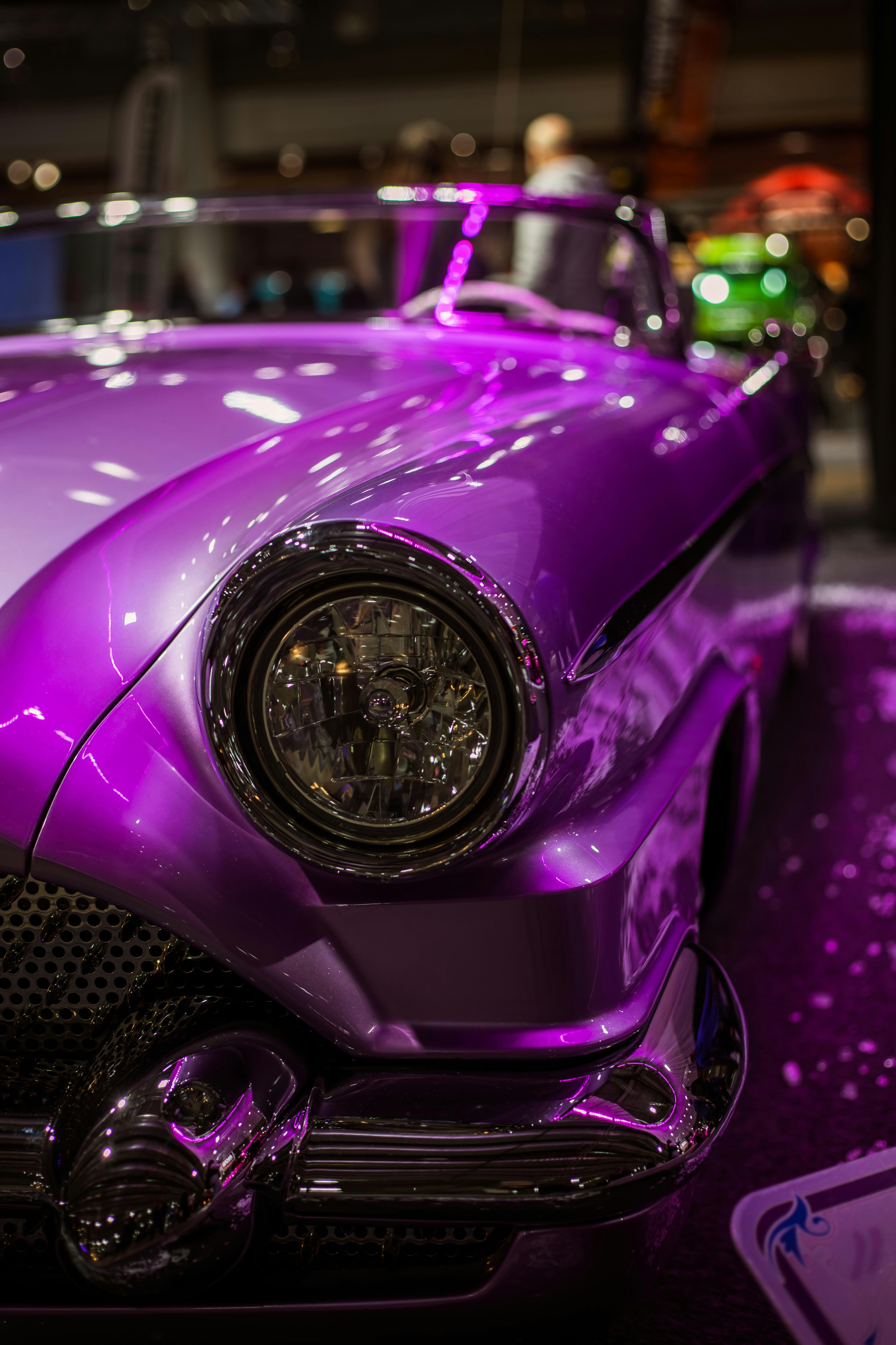 Close-up of a shiny purple vintage car