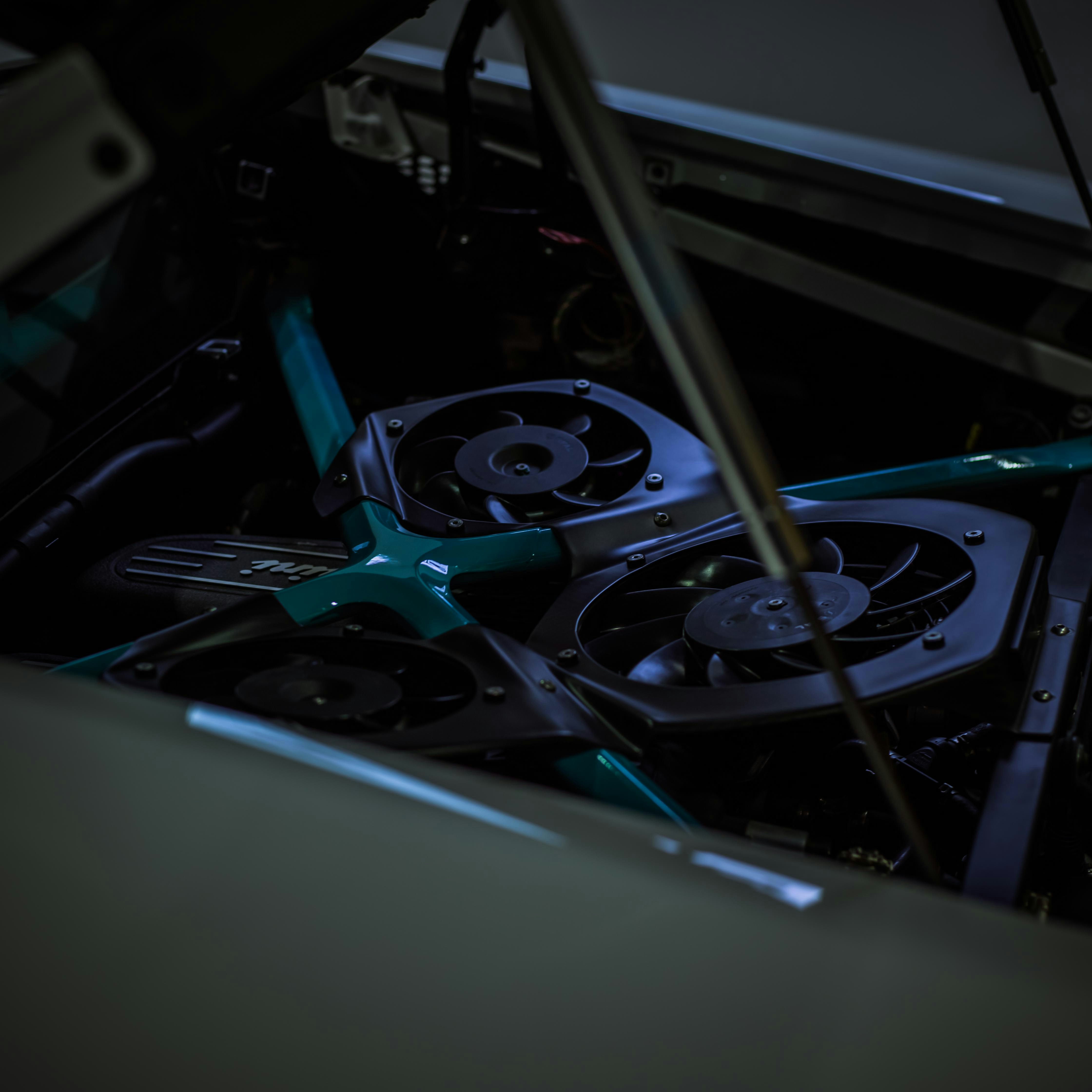 Close-up view of car engine cooling fans.