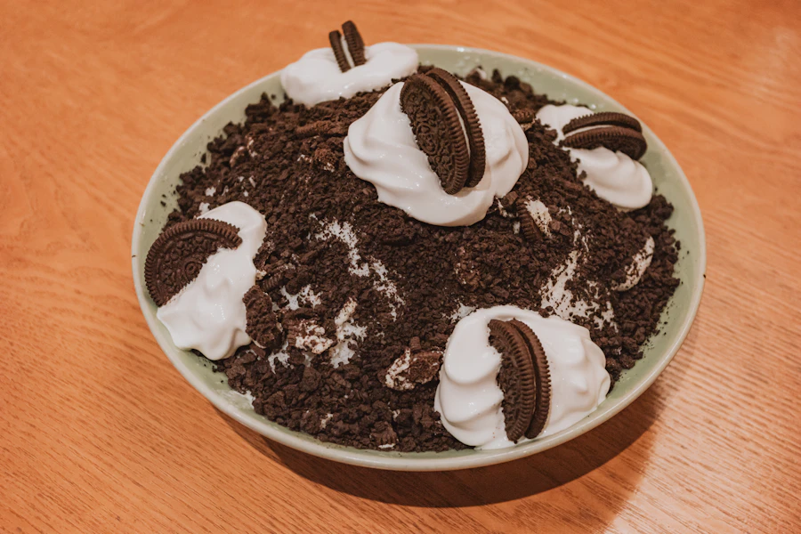A bowl of cookies-and-cream bingsu topped with whipped cream and chocolate sandwich cookies