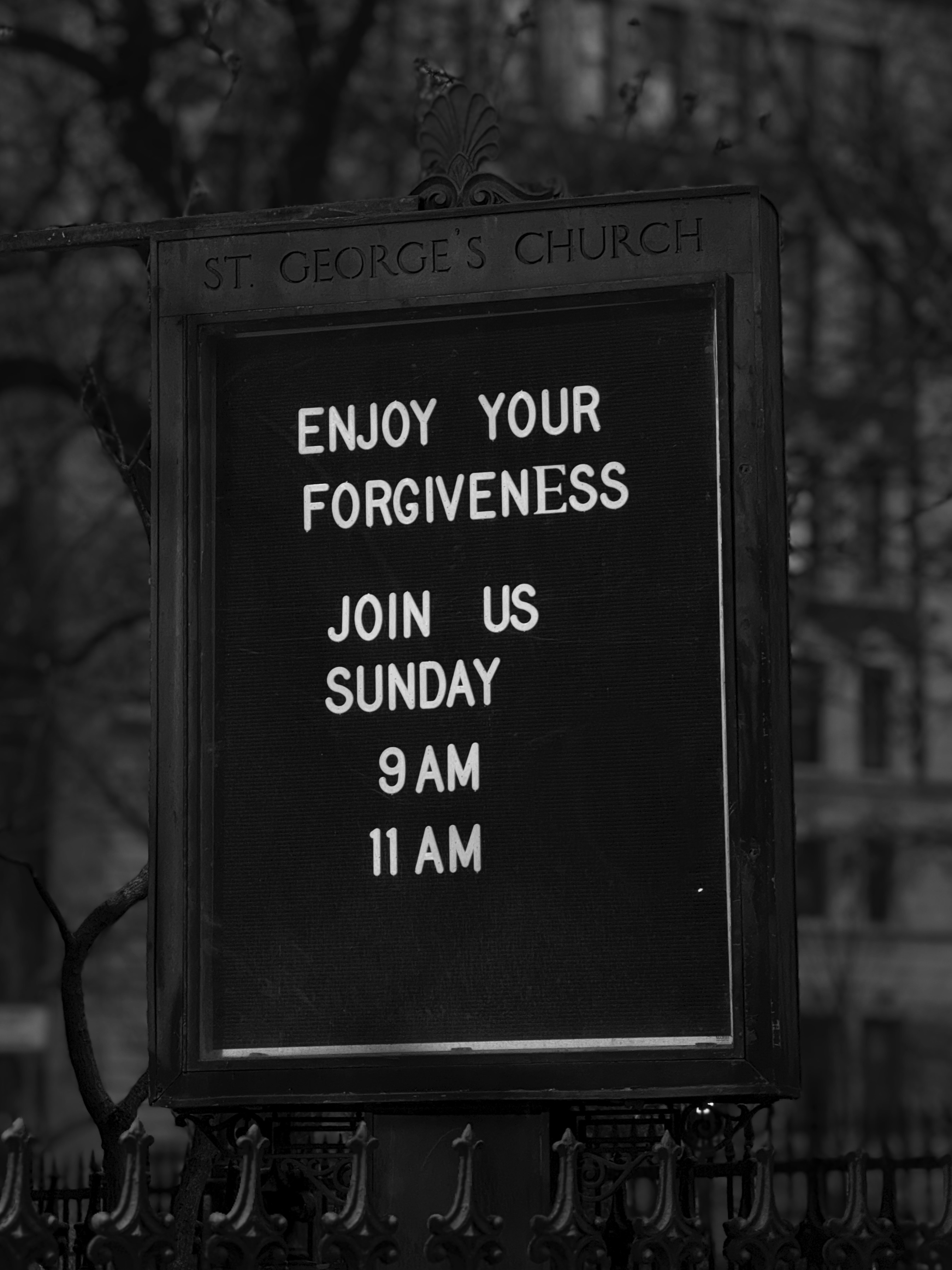 St george's church sign invites to sunday service.