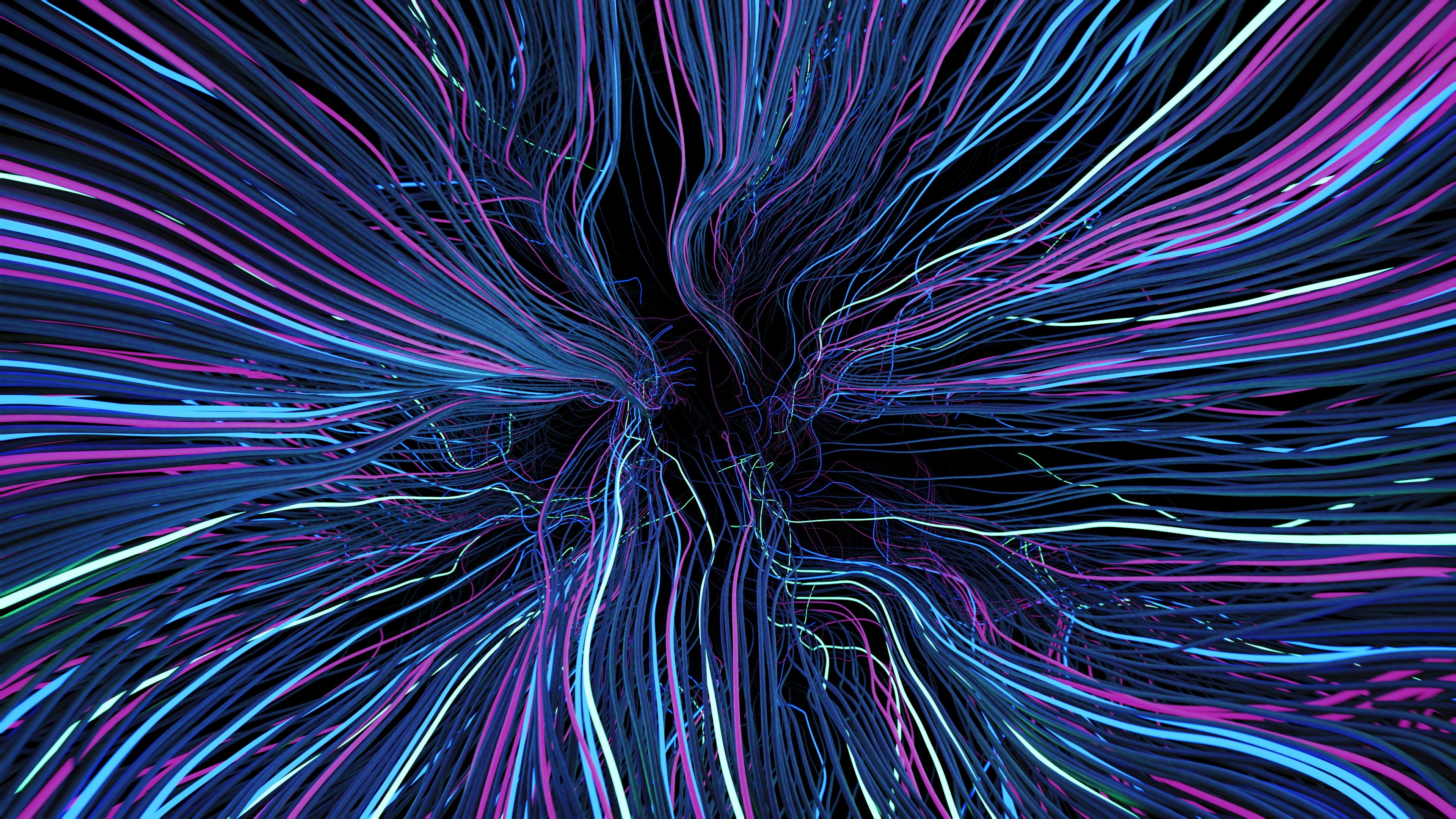 Abstract colorful lines flowing outwards from a central point.