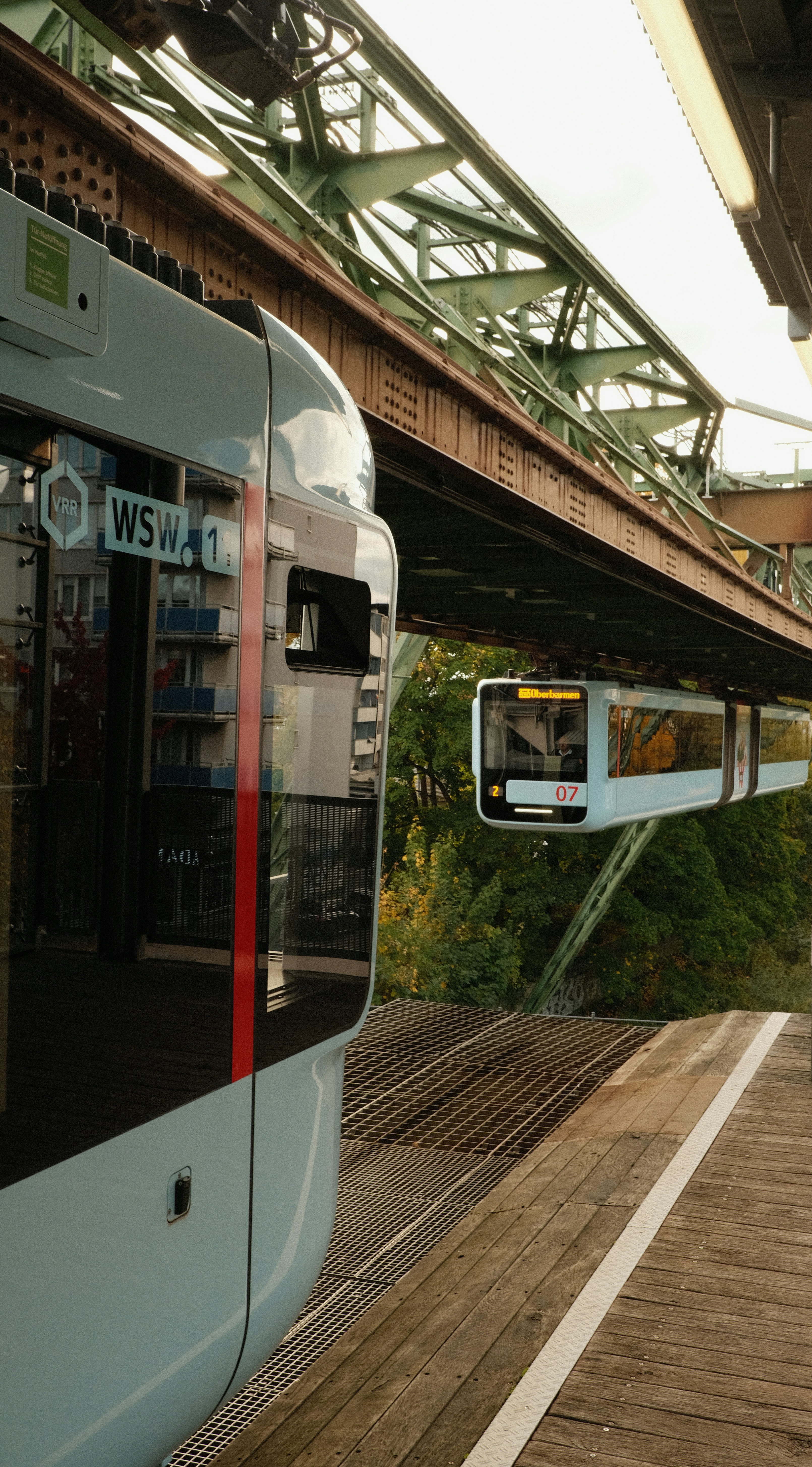 Two suspended trains on a railway track