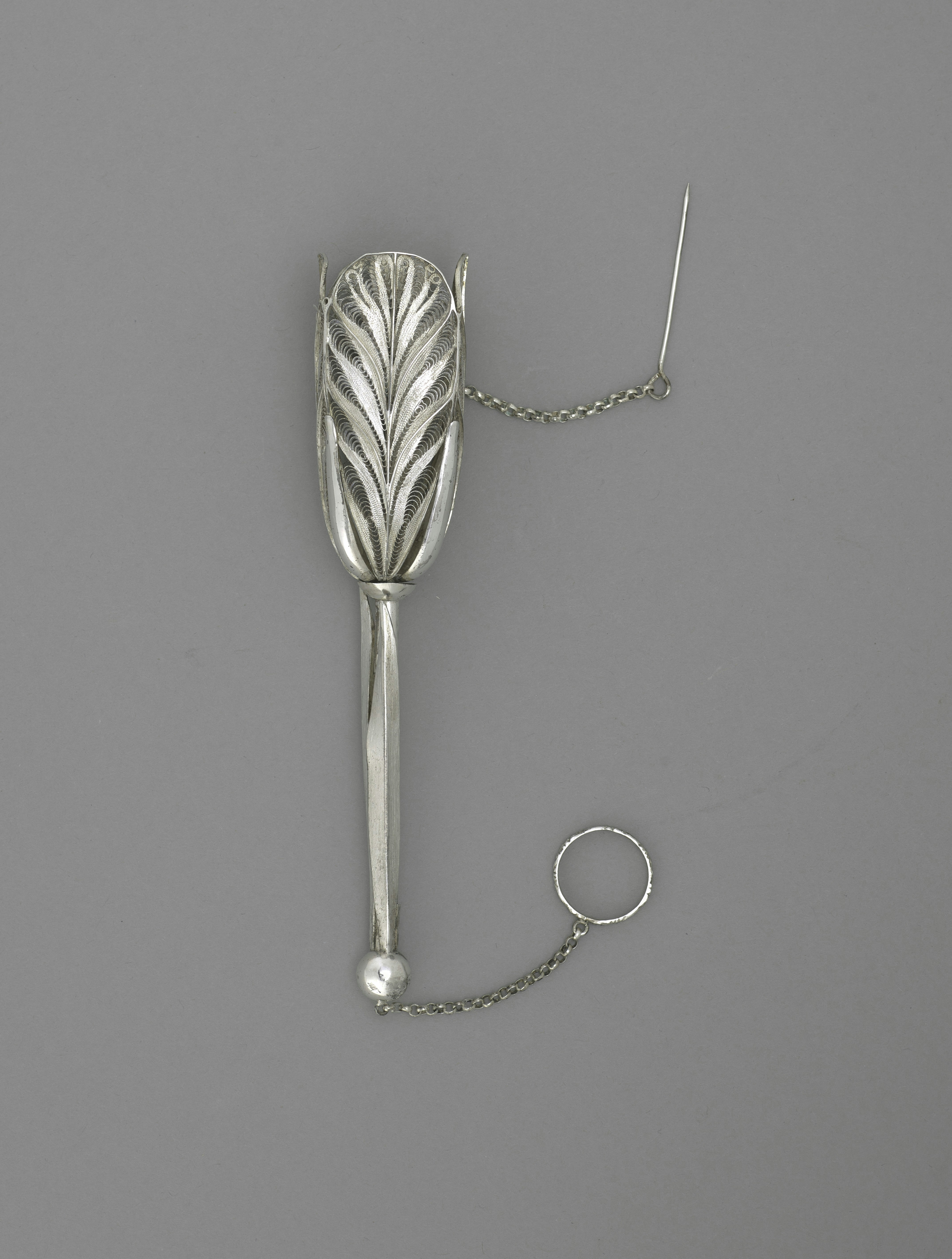 Celuk Gold & Silver Artisan Village — Handcrafted silver filigree case showing complex wire arabesques and micro-soldered granulation beads.
