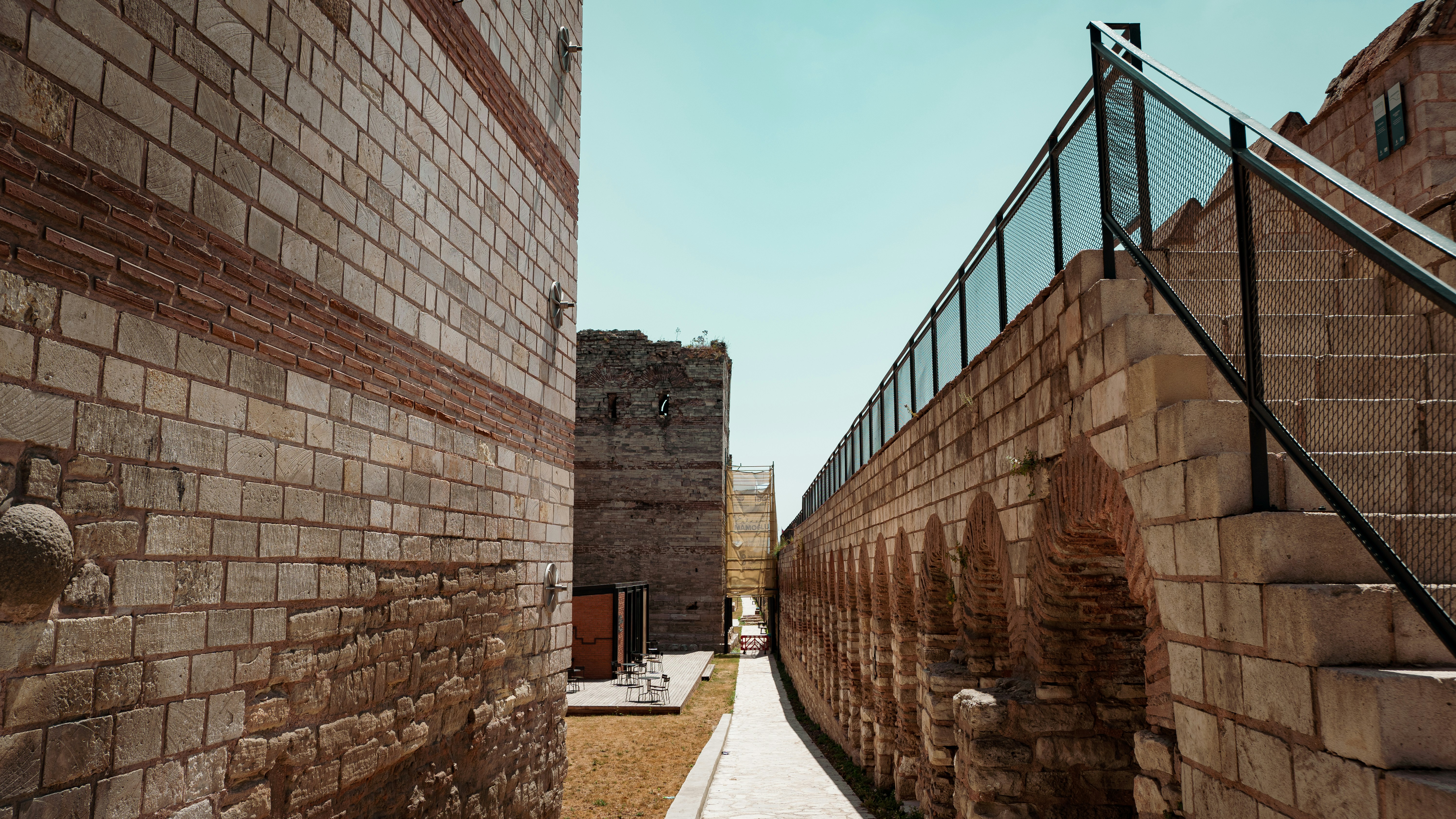 Stone walls and stairs leading to a building entrance