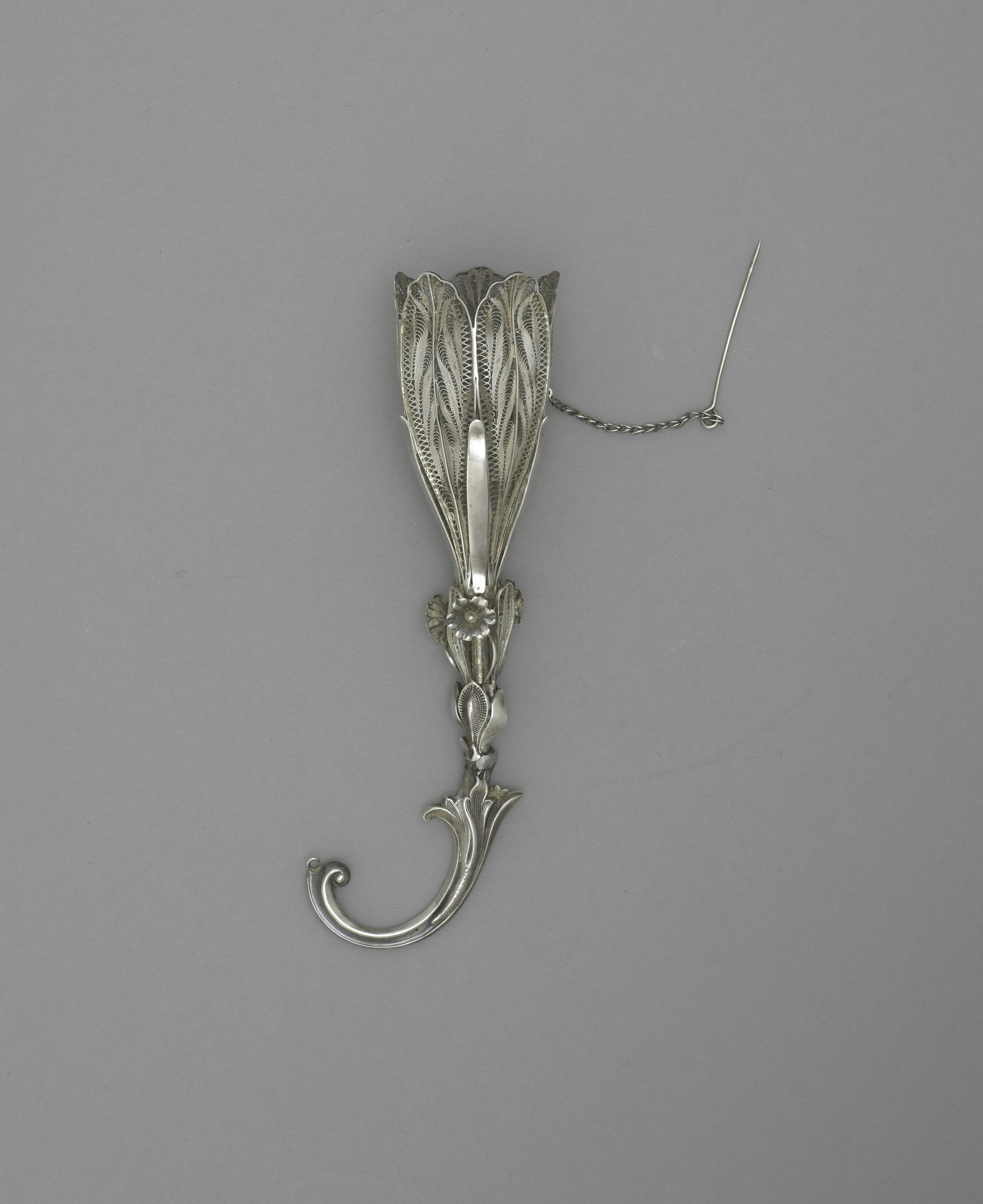 Celuk Gold & Silver Artisan Village — Exquisite sterling silver filigree artwork displaying traditional Balinese floral scrollwork and delicate openwork.