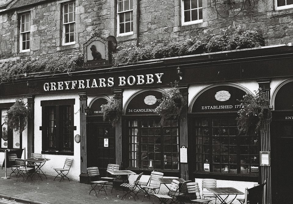 Greyfriars Bobby pub exterior with outdoor seating in Edinburgh's Old Town