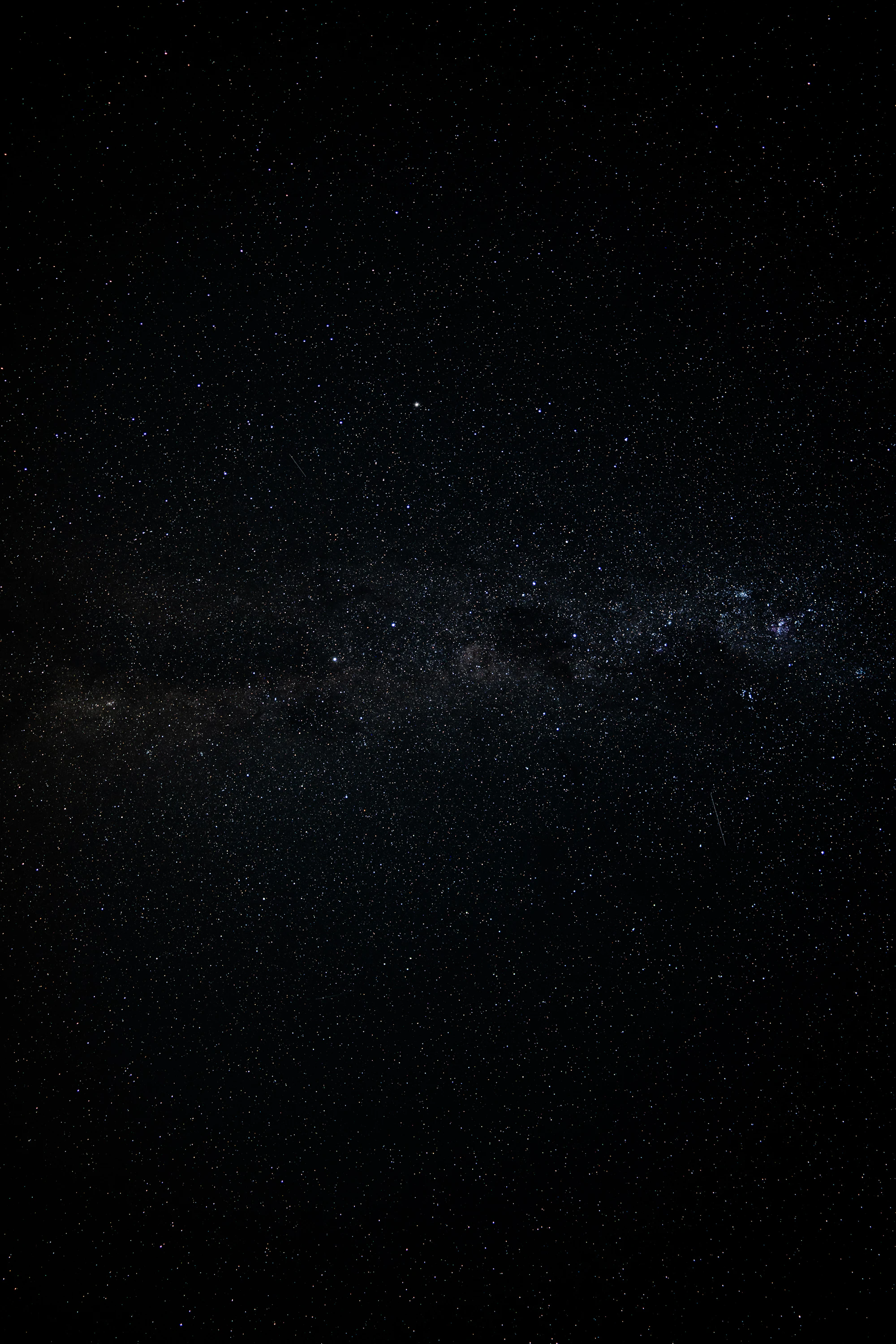 A vast starry night sky with the Milky Way visible