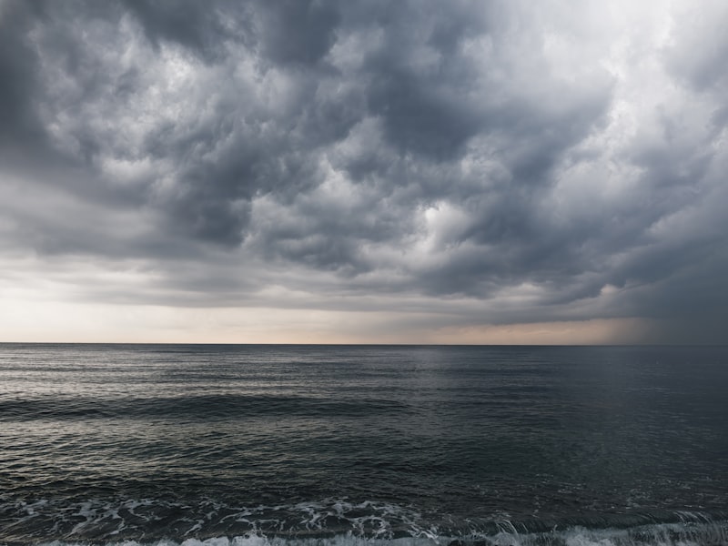 Dark stormy clouds over a choppy ocean