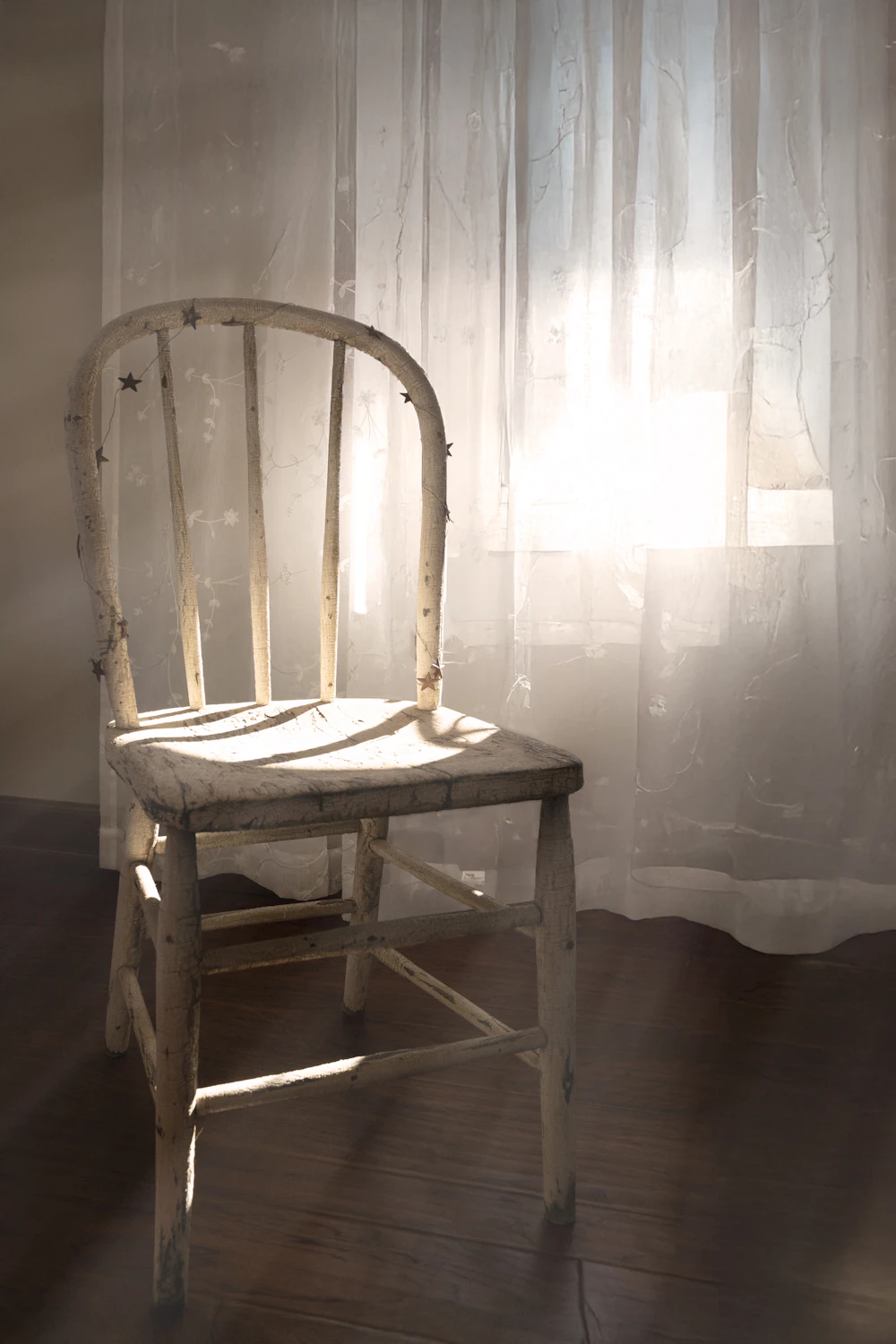 Old wooden chair in warm sunlight