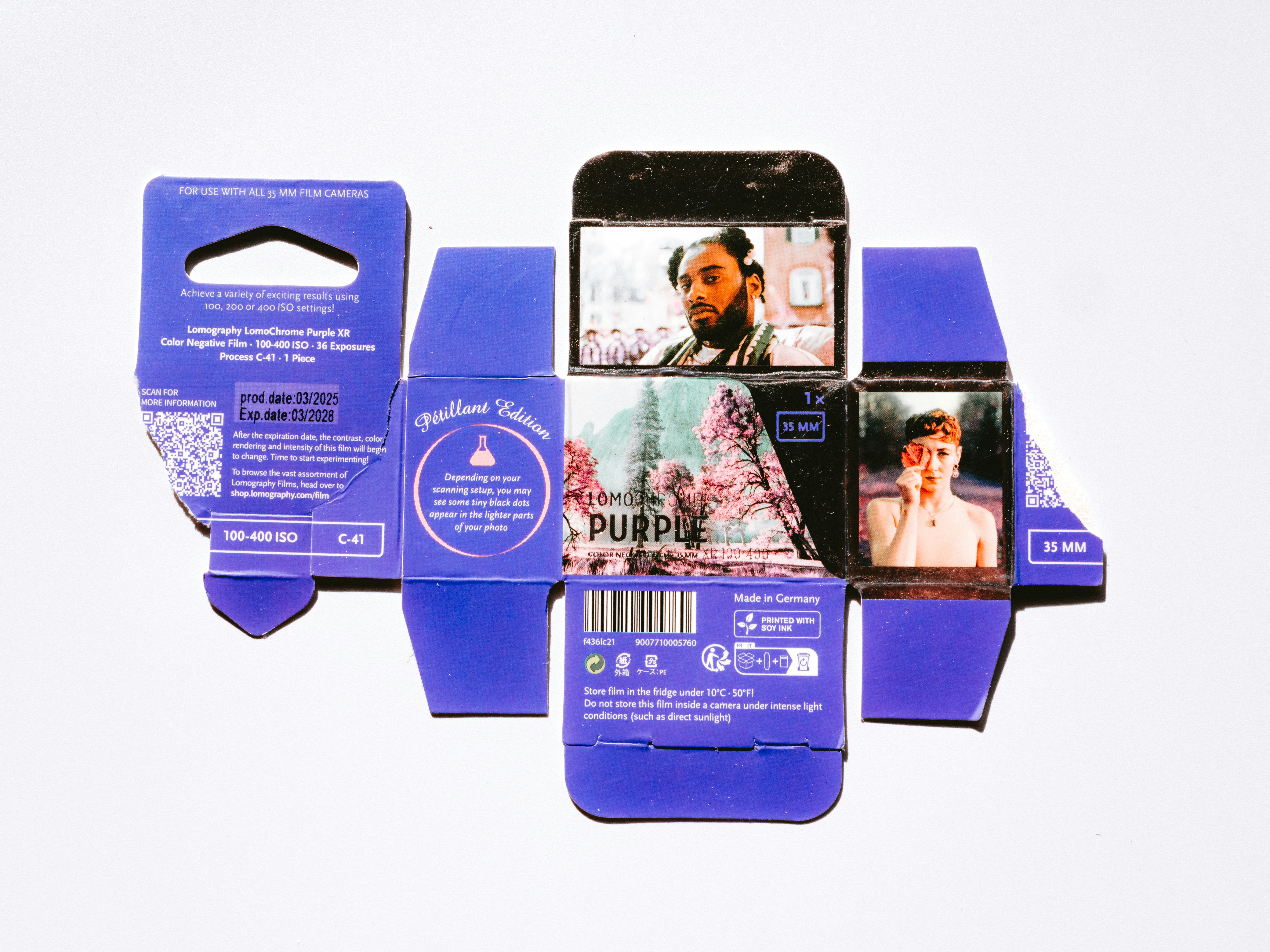 Unfolded purple box with images of people