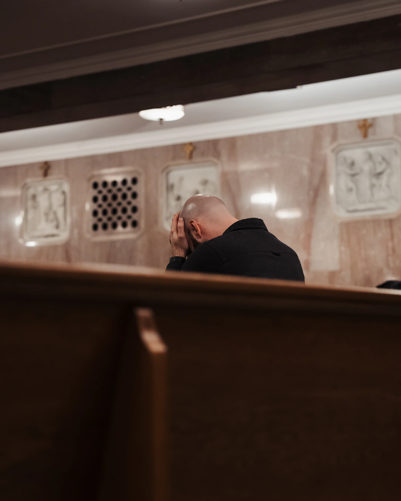 Quiet moment of prayer in an empty pew