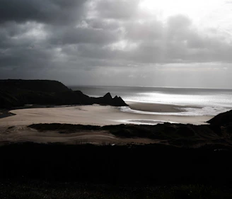 Dramatic cloudy sky over a sandy beach landscape