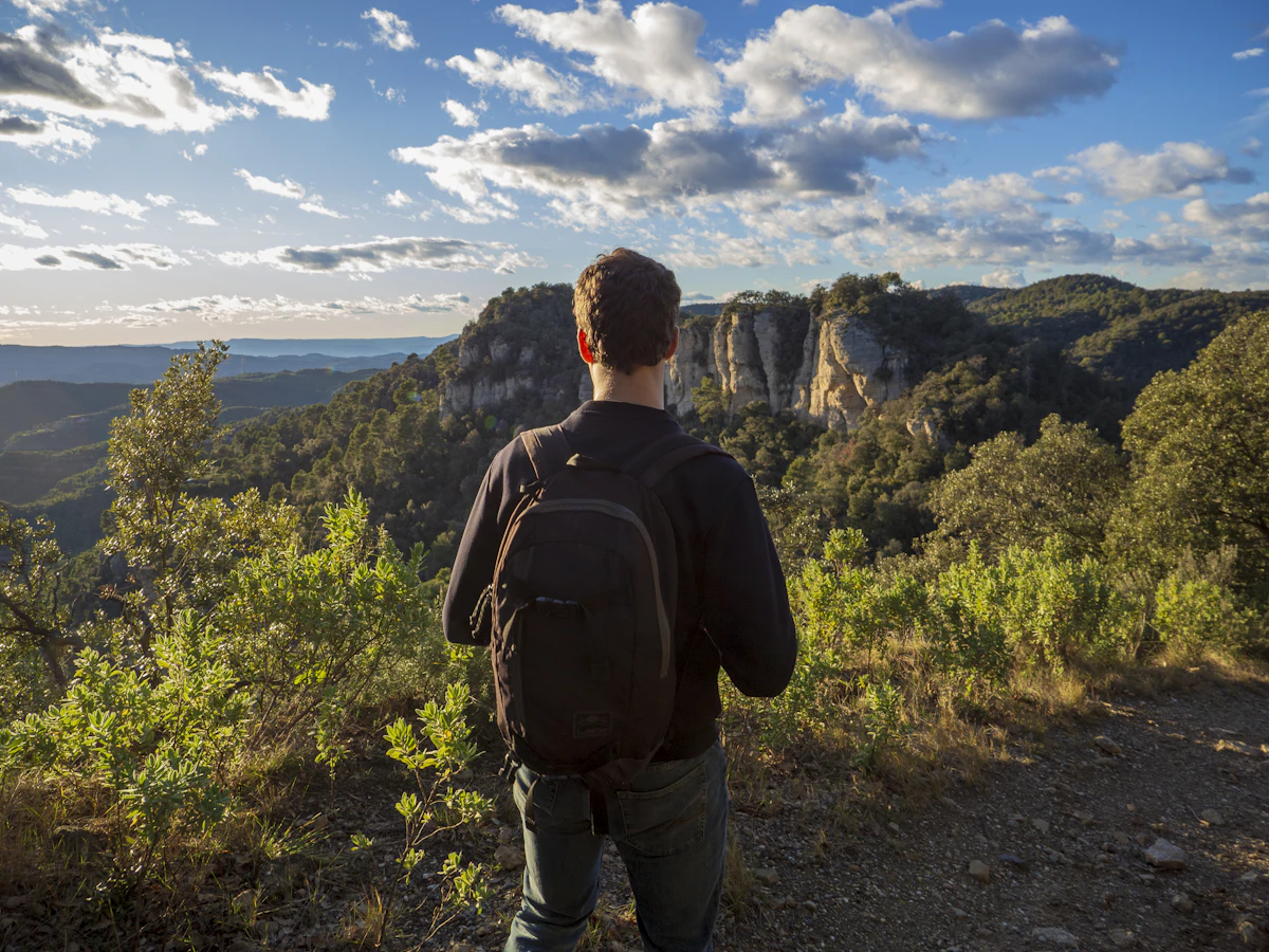 Backpack carried along a mountain trail