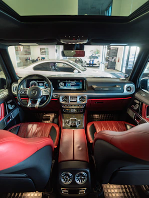 Luxury car interior with red and black leather seats
