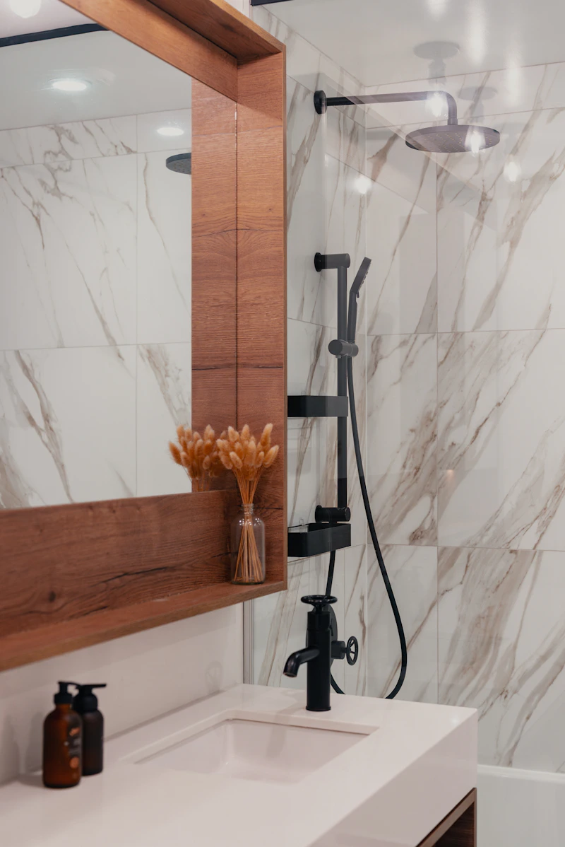 Marble shower with arabesque accent tiles