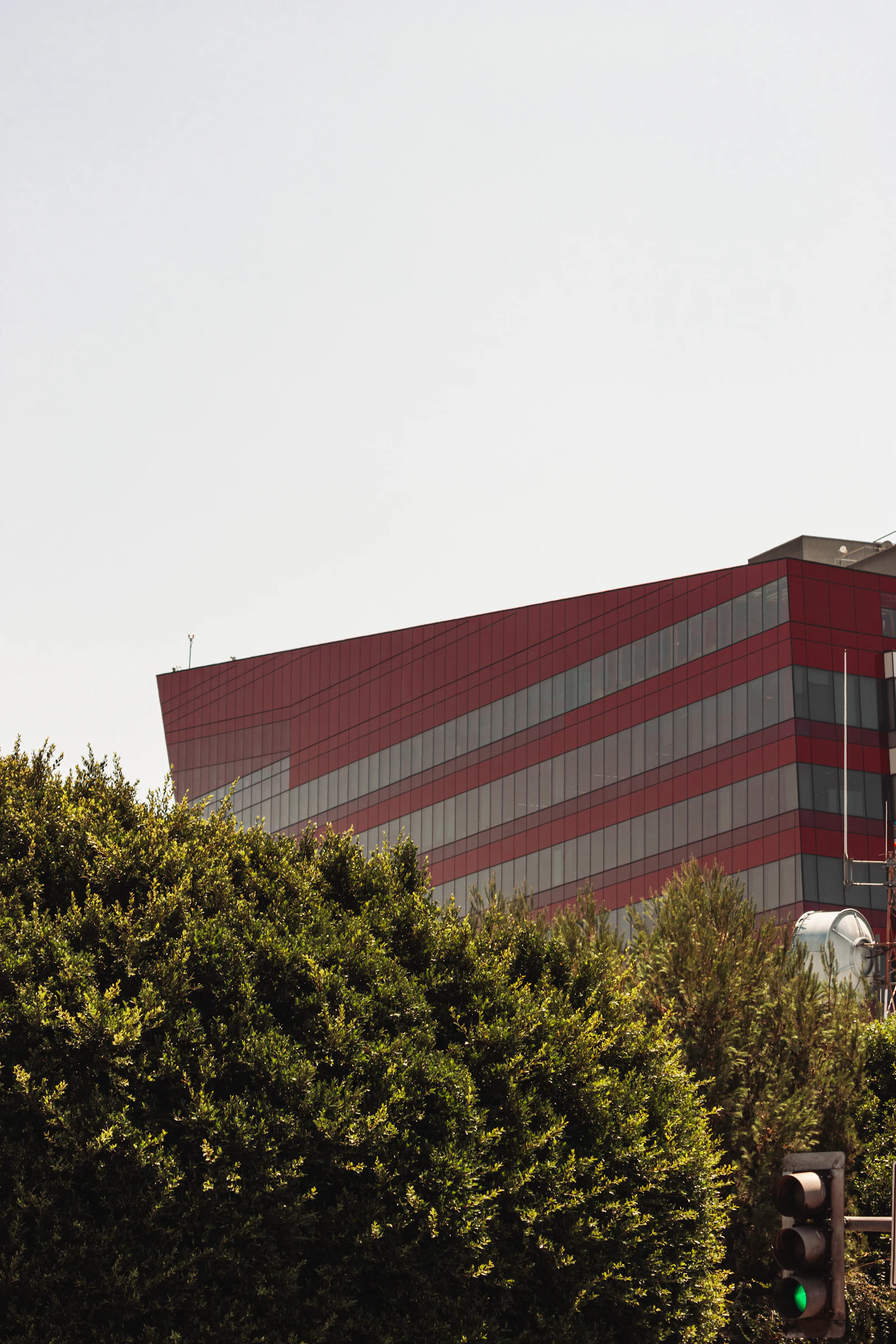 Modern office building representing office-heavy reporting operations.