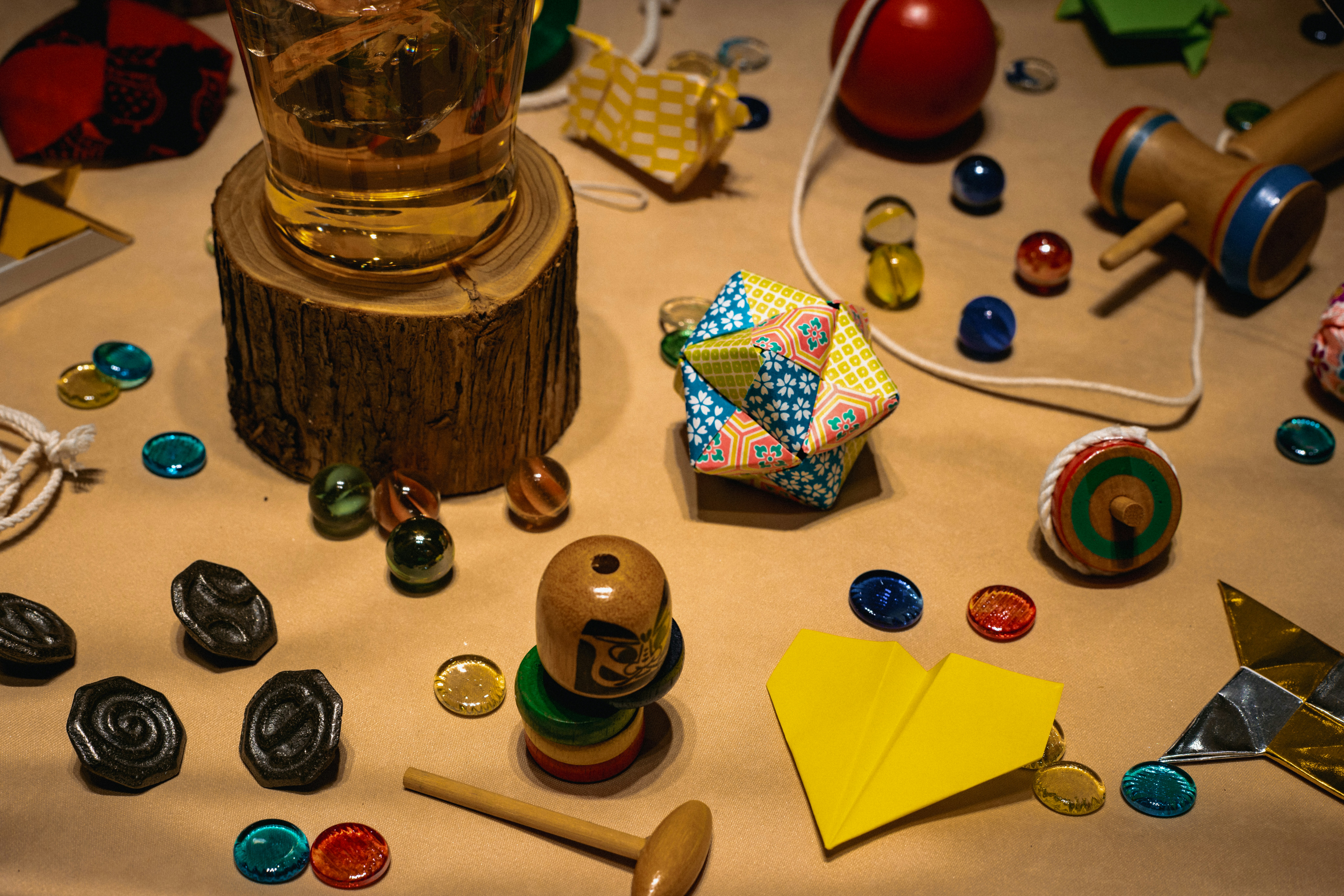 Collection of vintage toys and marbles on a surface