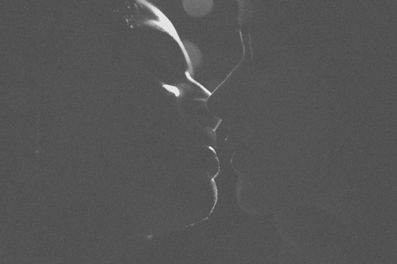 Couple kissing in silhouette together