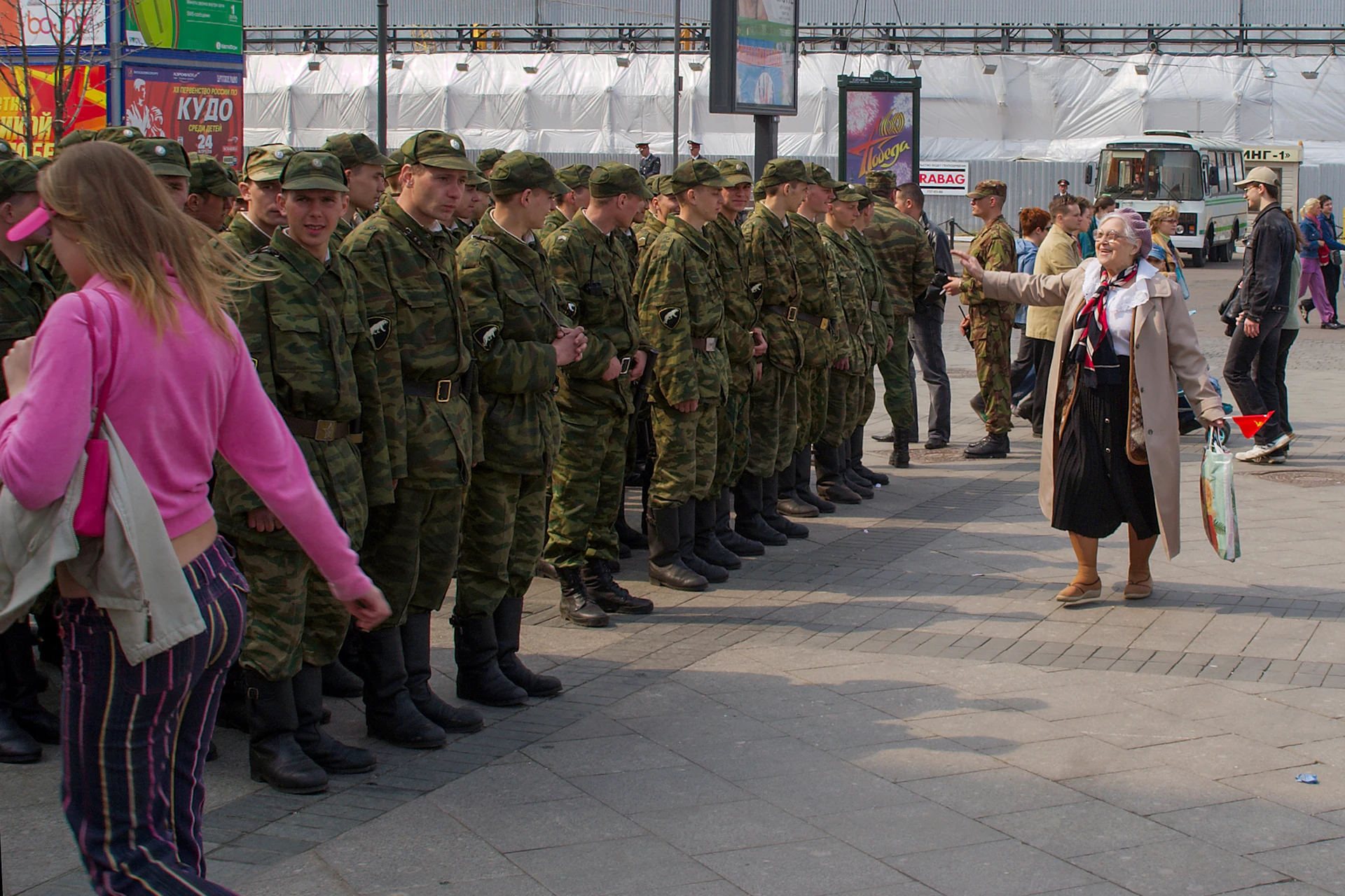 A woman veteran leader with fellow servicemembers