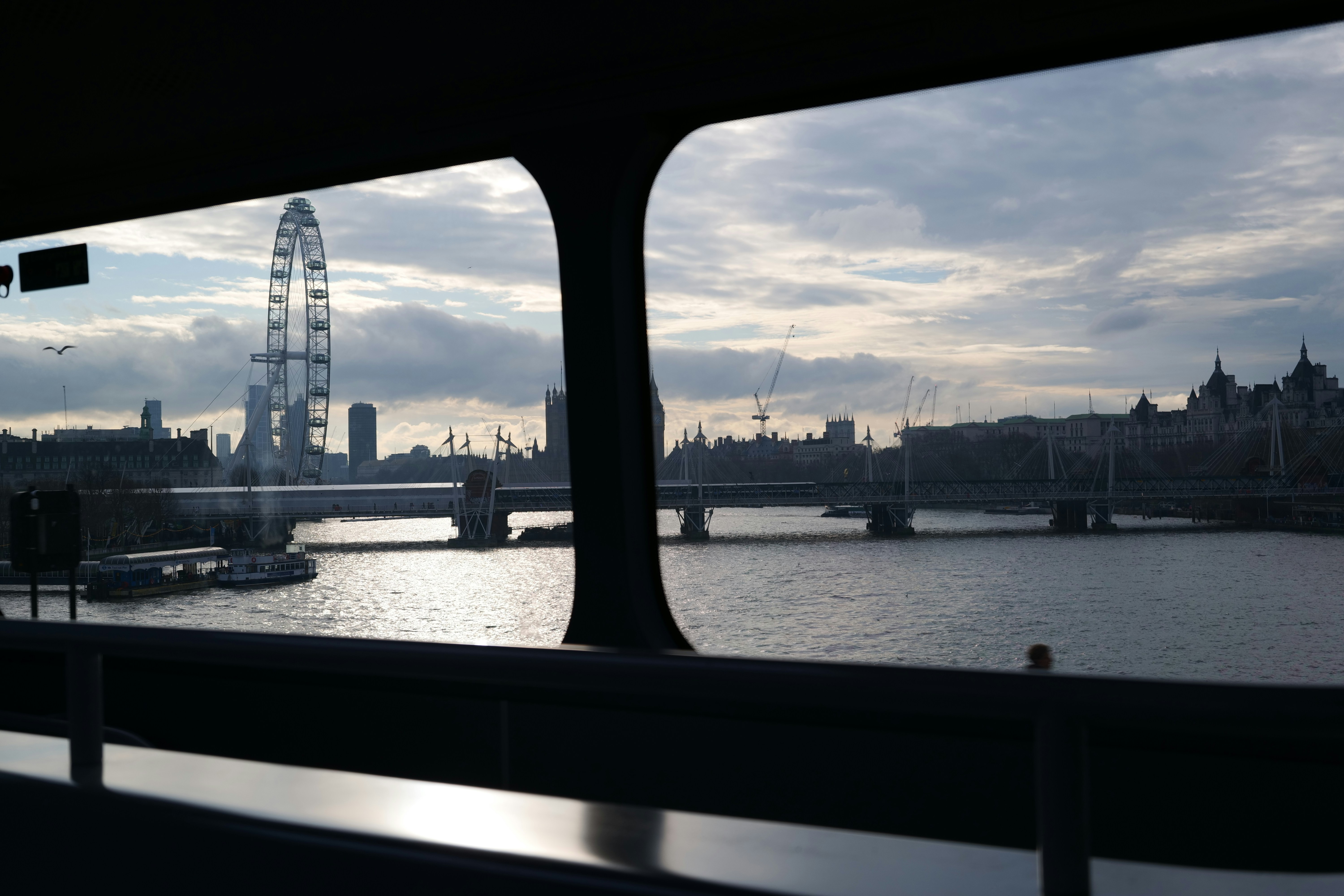 London eye and cityscape across the river at dusk