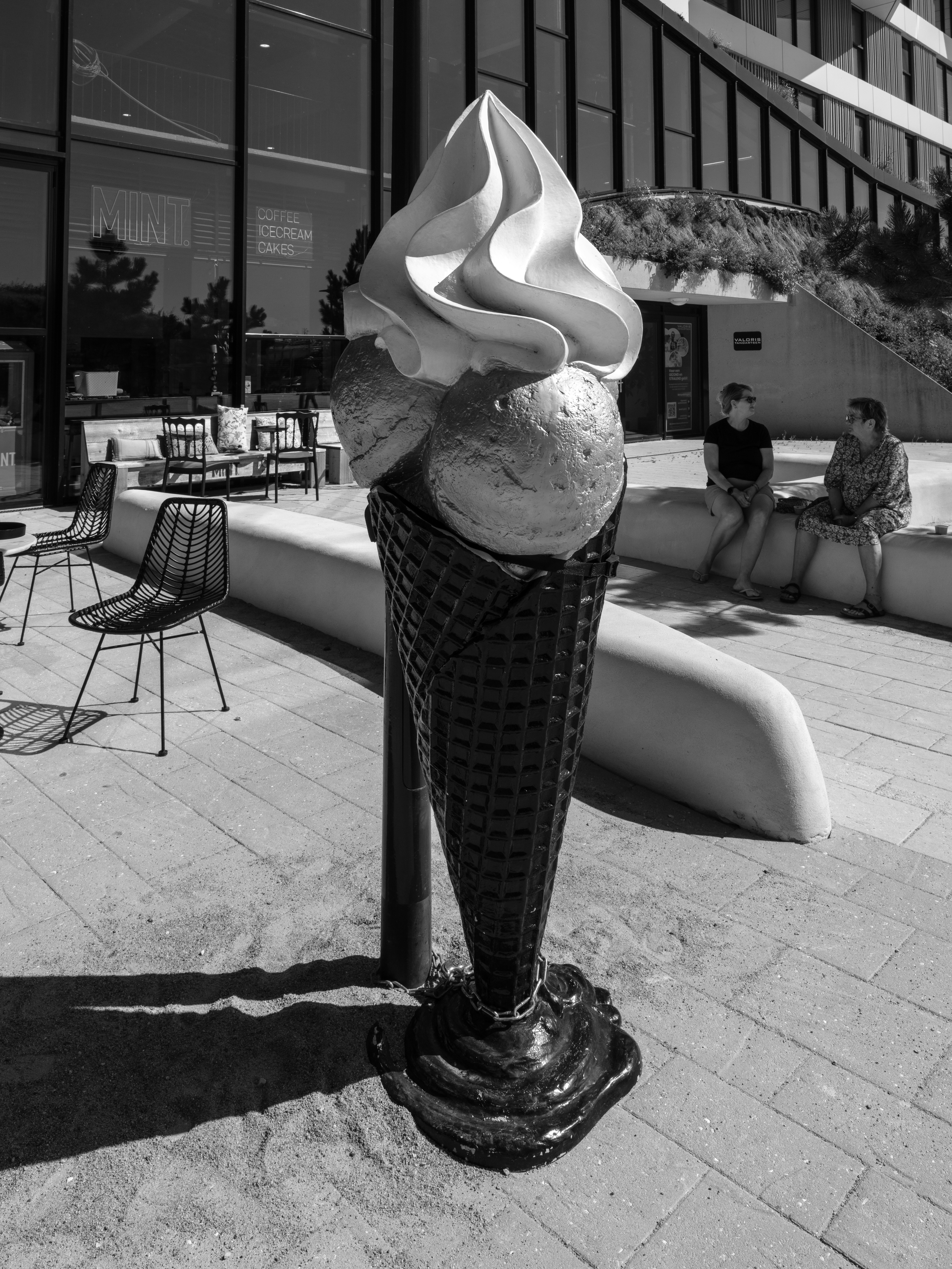 Giant ice cream cone sculpture on a sunny day
