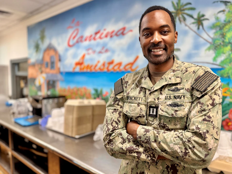 Smiling service member in uniform