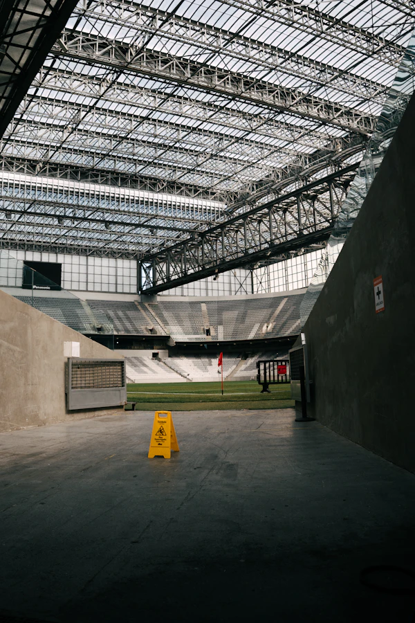Atlanta stadium - Empty stadium interior with a caution sign on the field.
