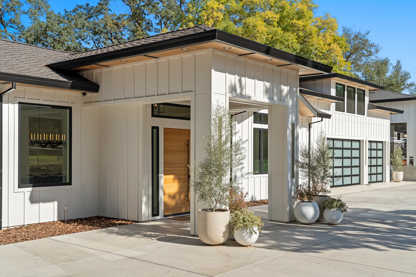 Modern Texas home with board-and-batten siding and dark trim