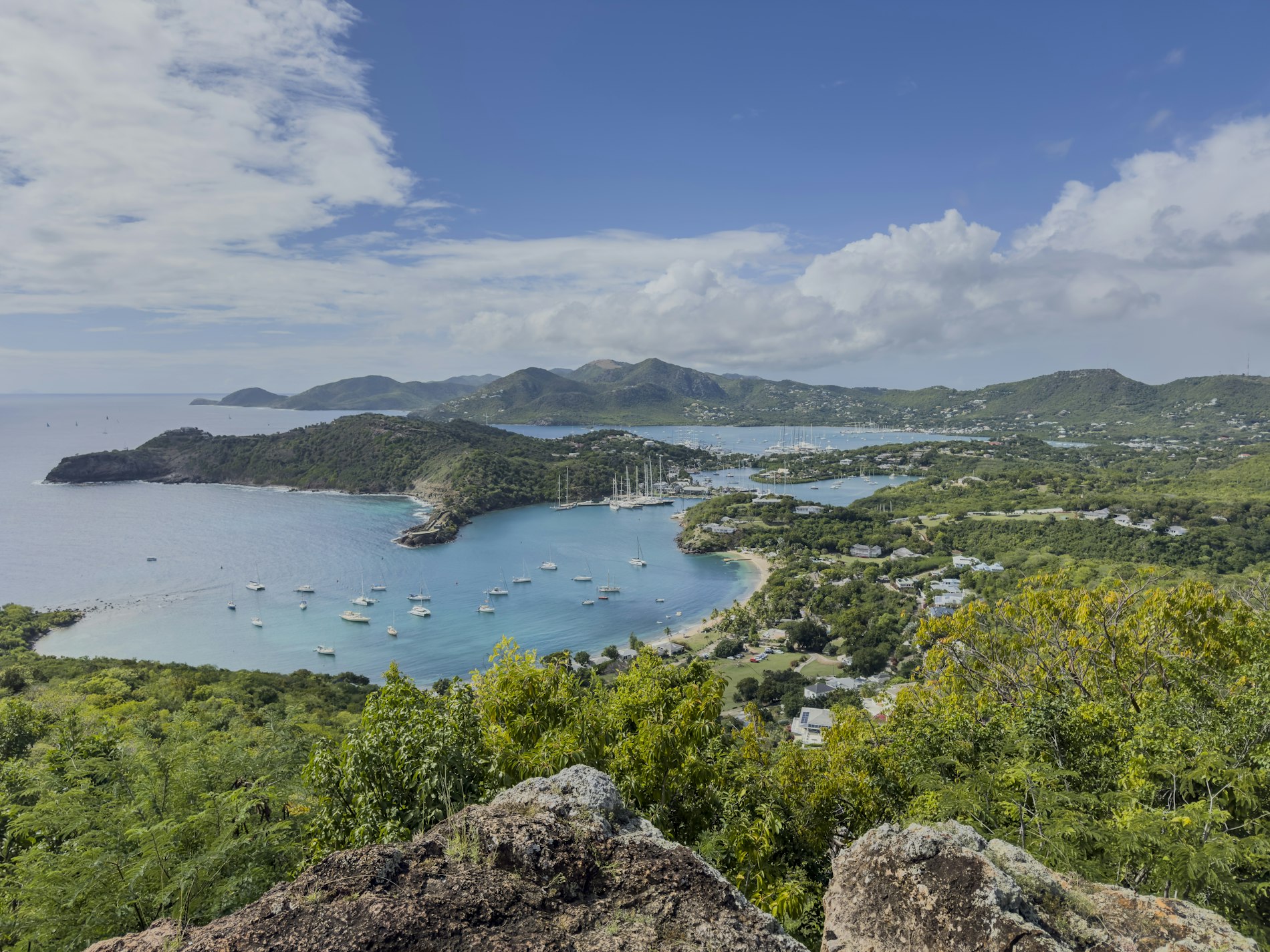 English Harbour and Falmouth Harbour from Shirley Heights, Antigua: Antigua and Barbuda citizenship by investment, Antigua ve Barbuda Pasaport Yenileme: Ücretler, Belgeler ve Süreç (2026)