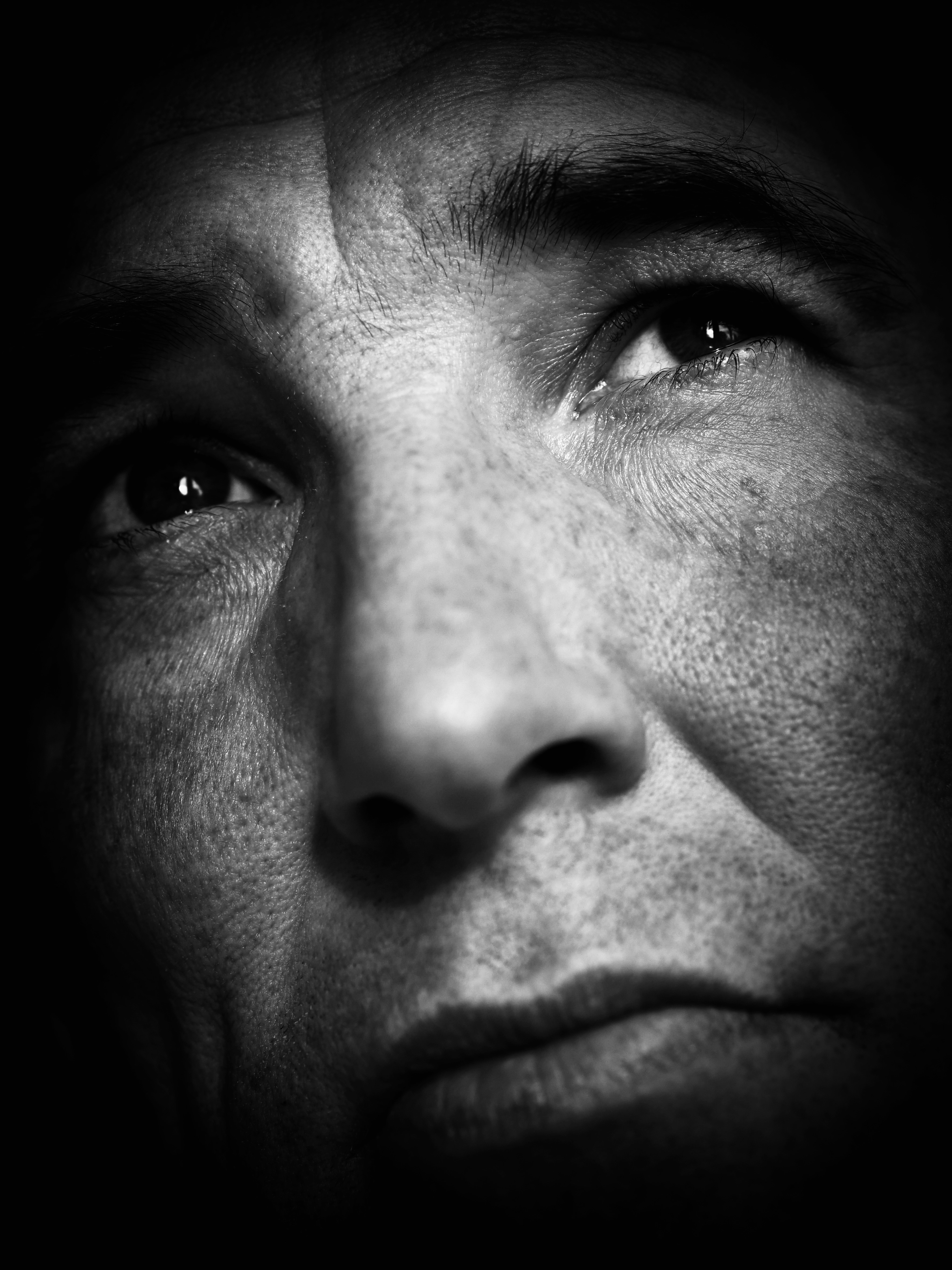 Close-up of a man's face with intense expression