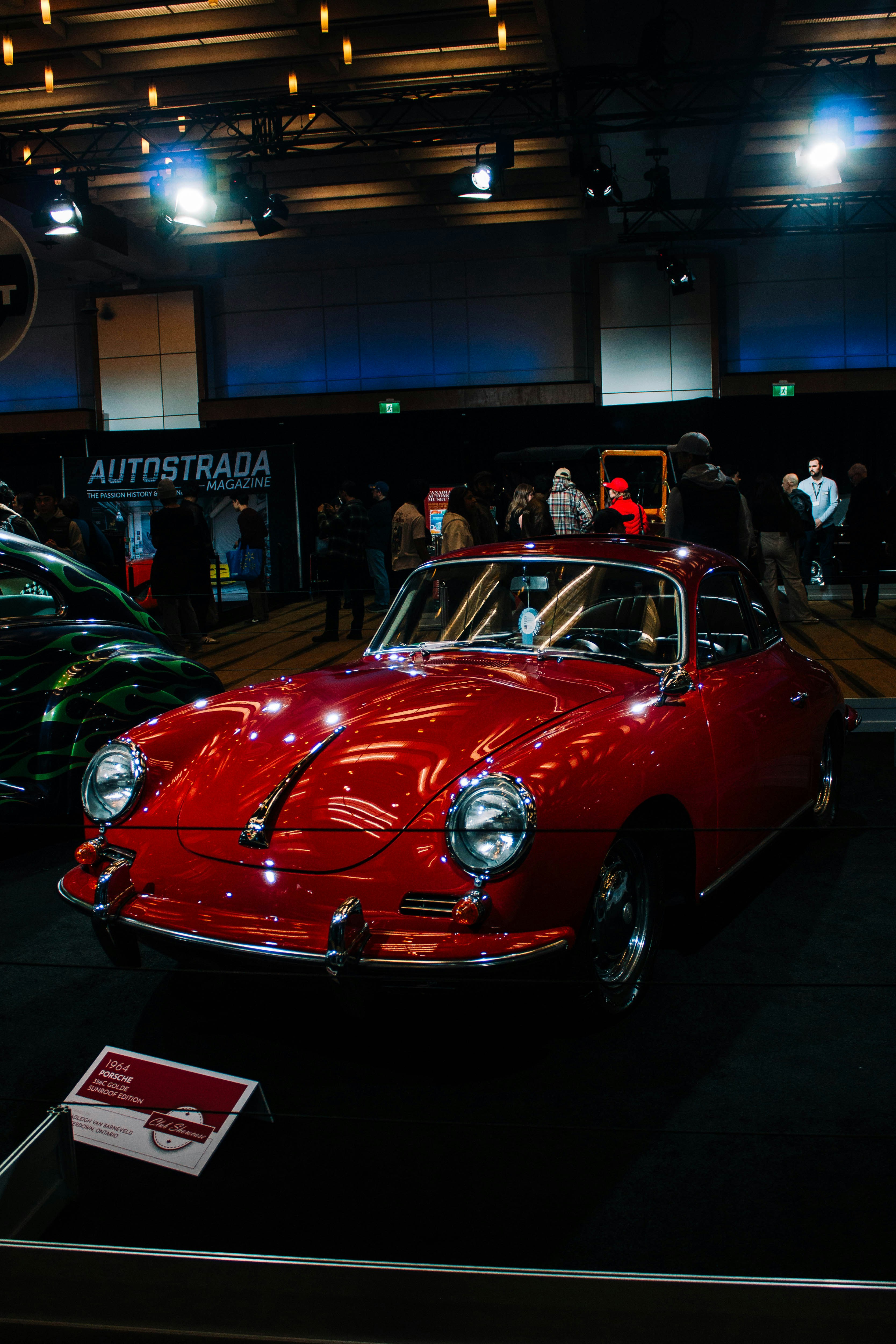 Classic red porsche coupe on display