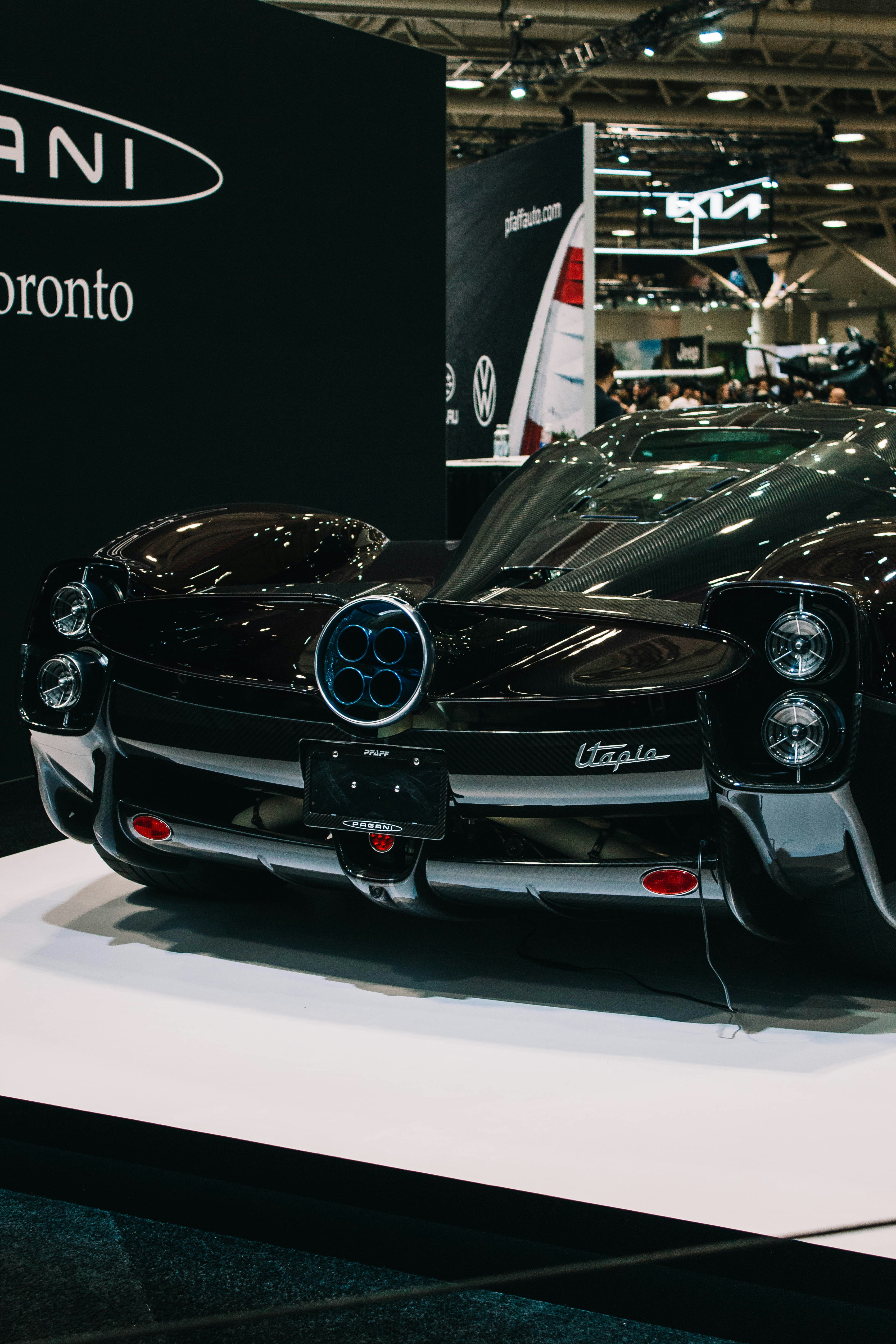 Rear view of a dark luxury sports car