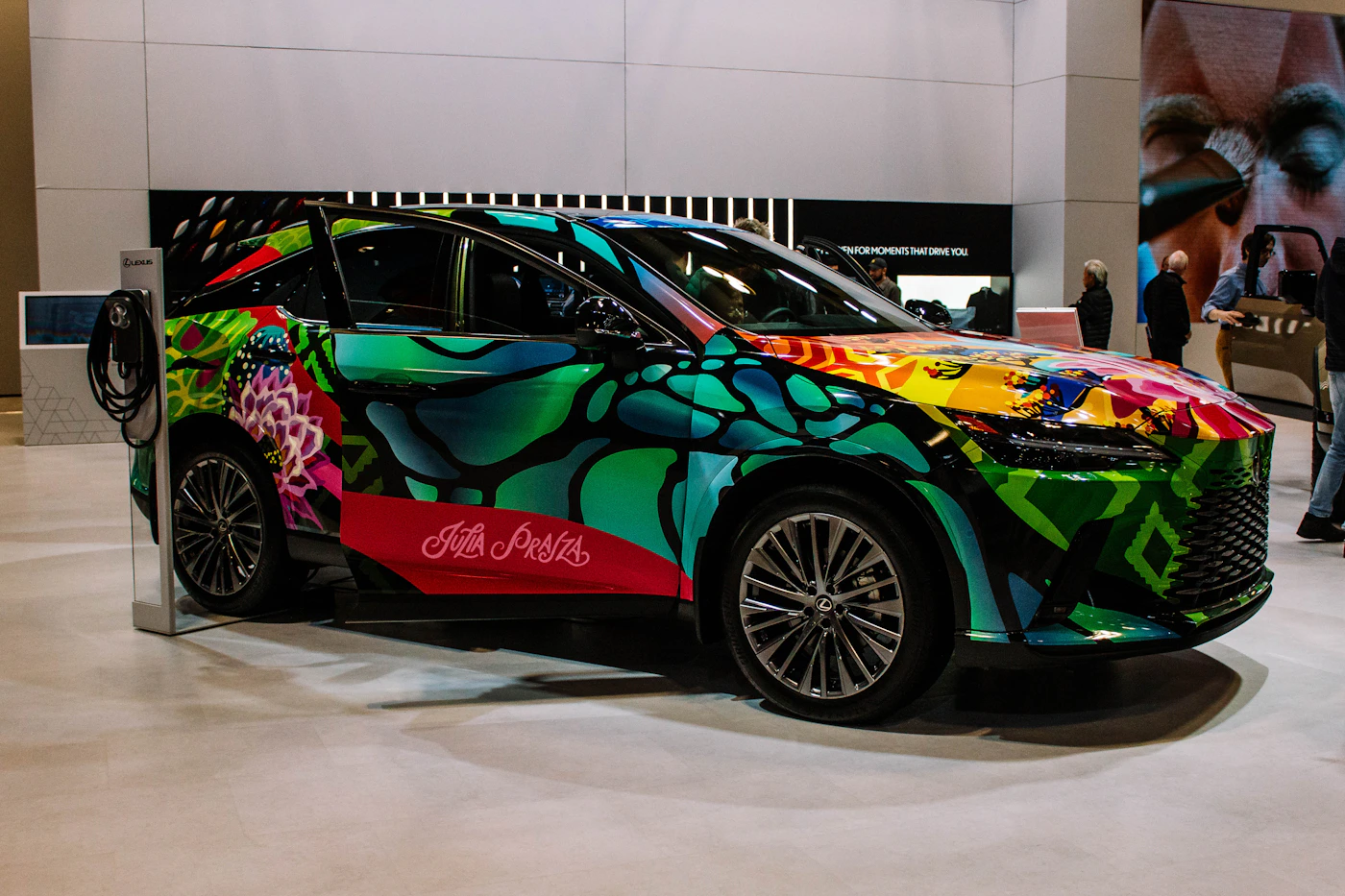 Car with vibrant abstract art wrap