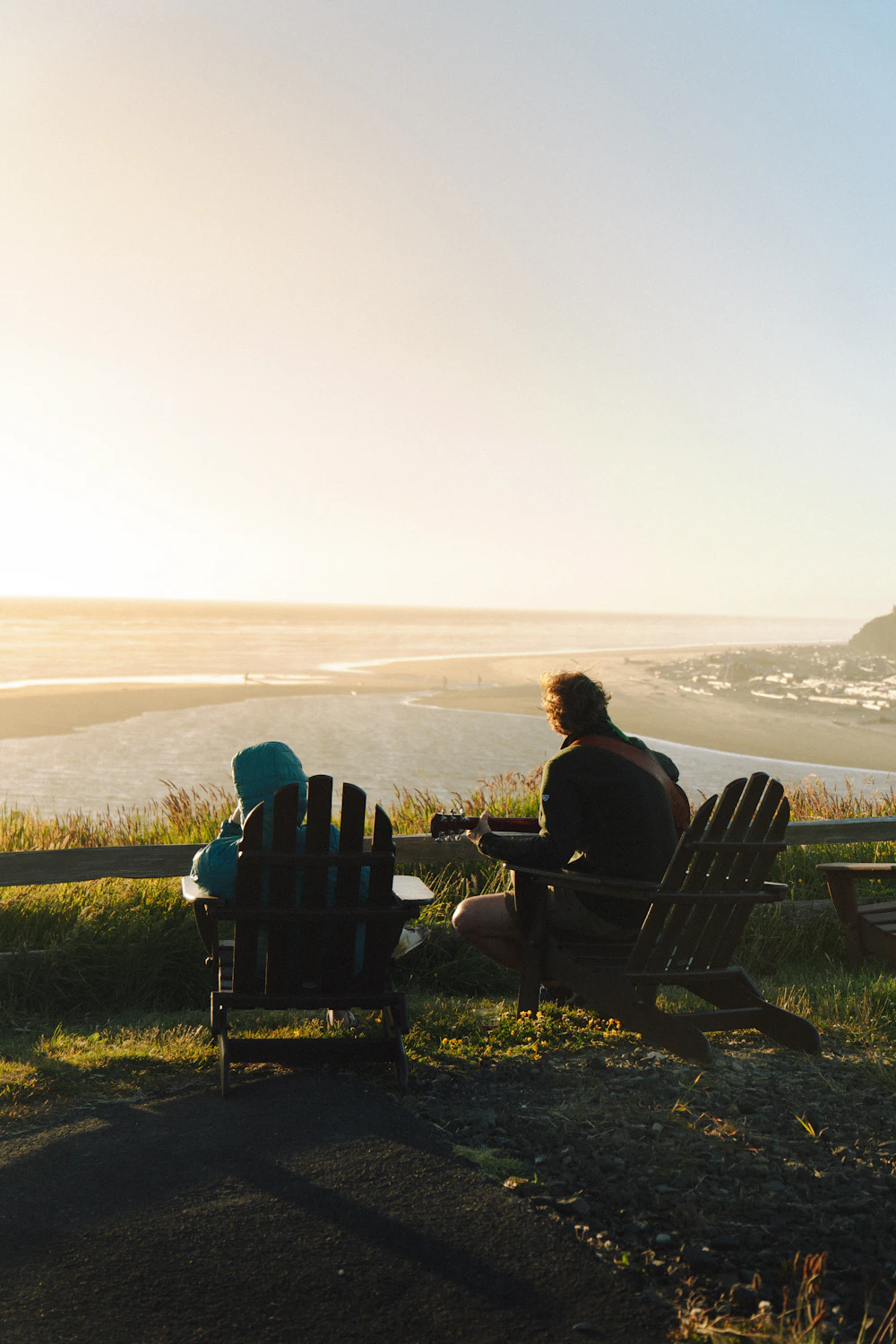 Couple enjoying a quiet ocean view at sunset
