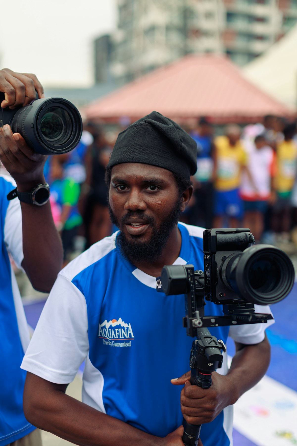 Content creator holding a professional camera and gimbal