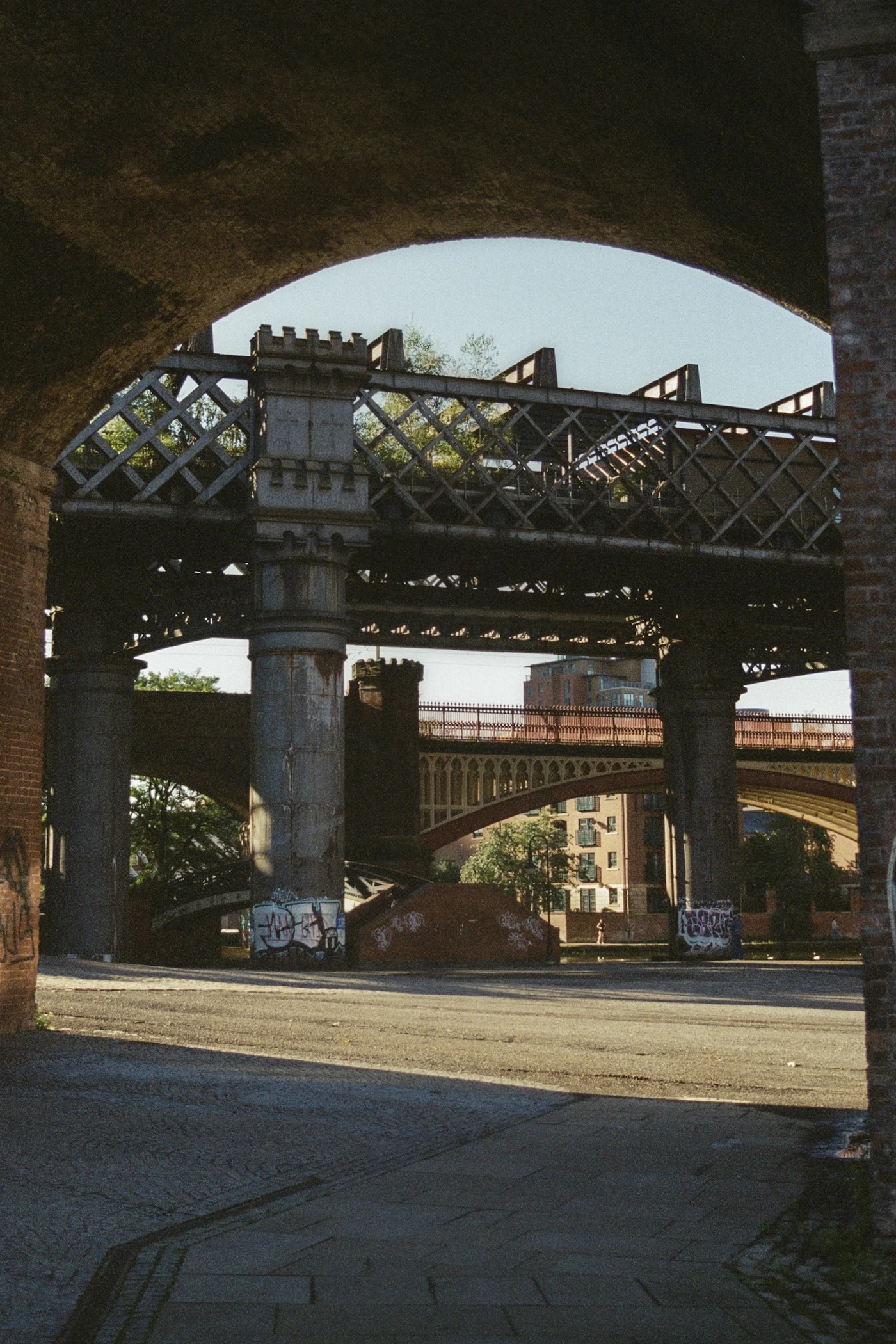 Brick railway arches and metal bridges in Manchester
